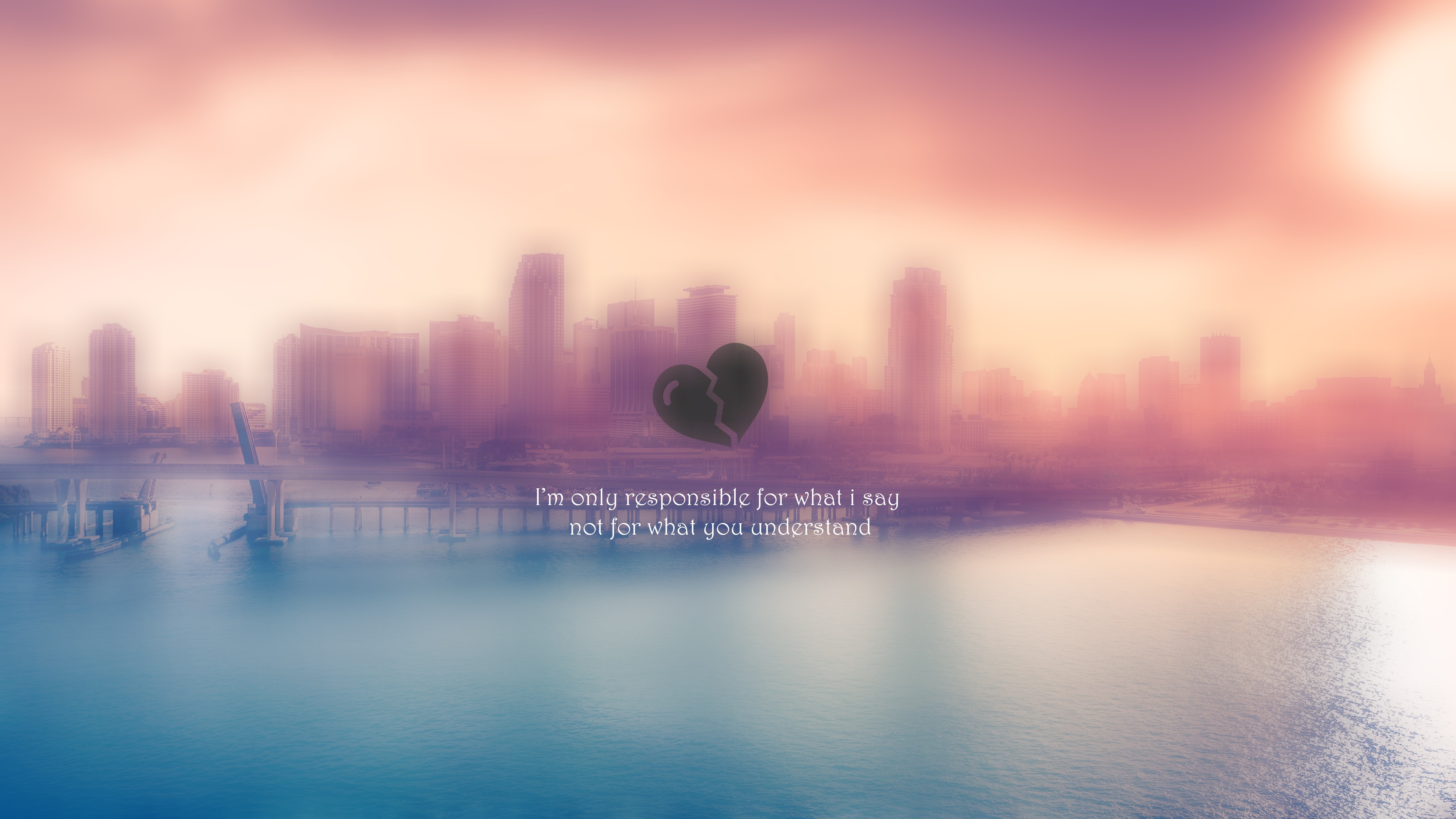 Broken heart quote over a city skyline at sunset HD Wallpaper