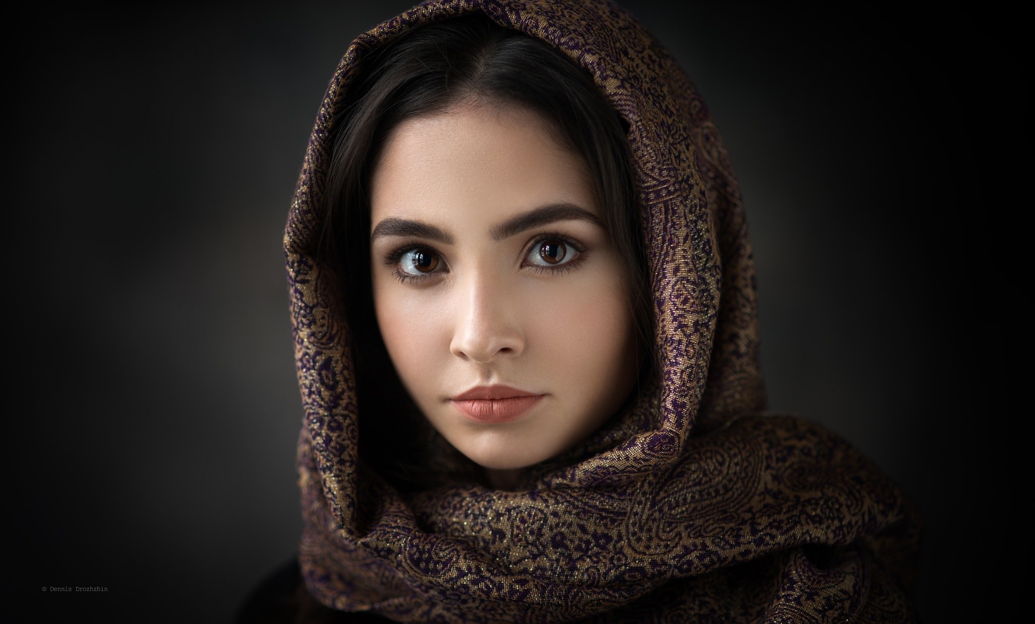 Portrait of a woman with a patterned headscarf HD Wallpaper