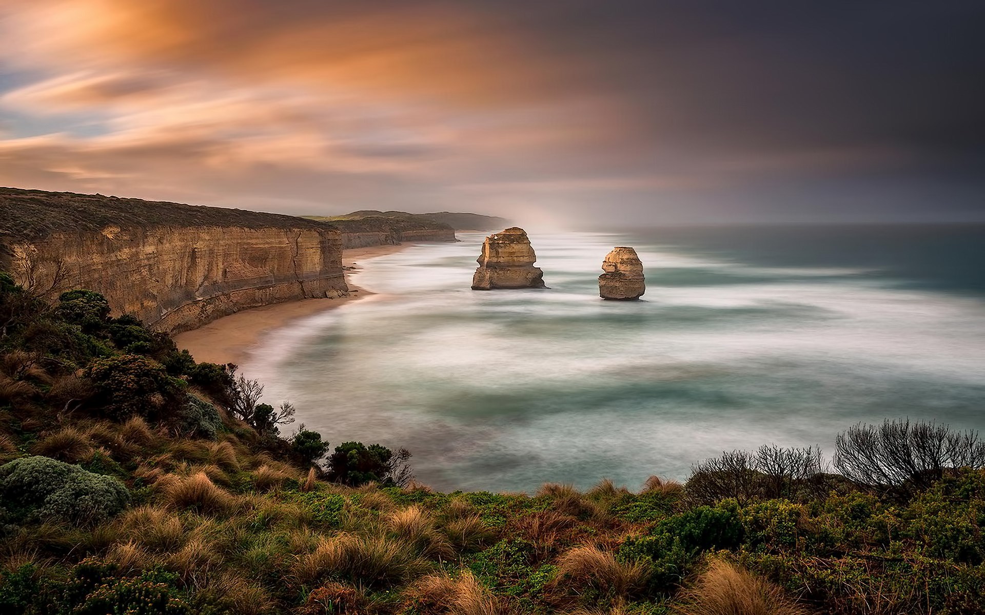 The Twelve Apostles rock formations at sunset HD Wallpaper
