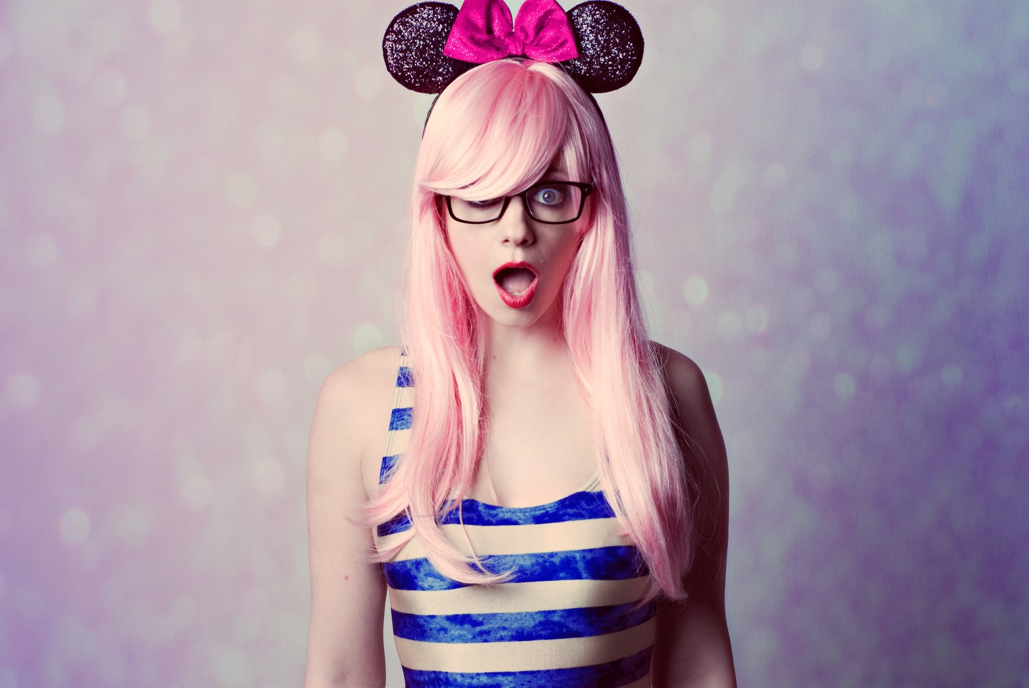 Woman with pink hair and Mickey Mouse ears HD Wallpaper