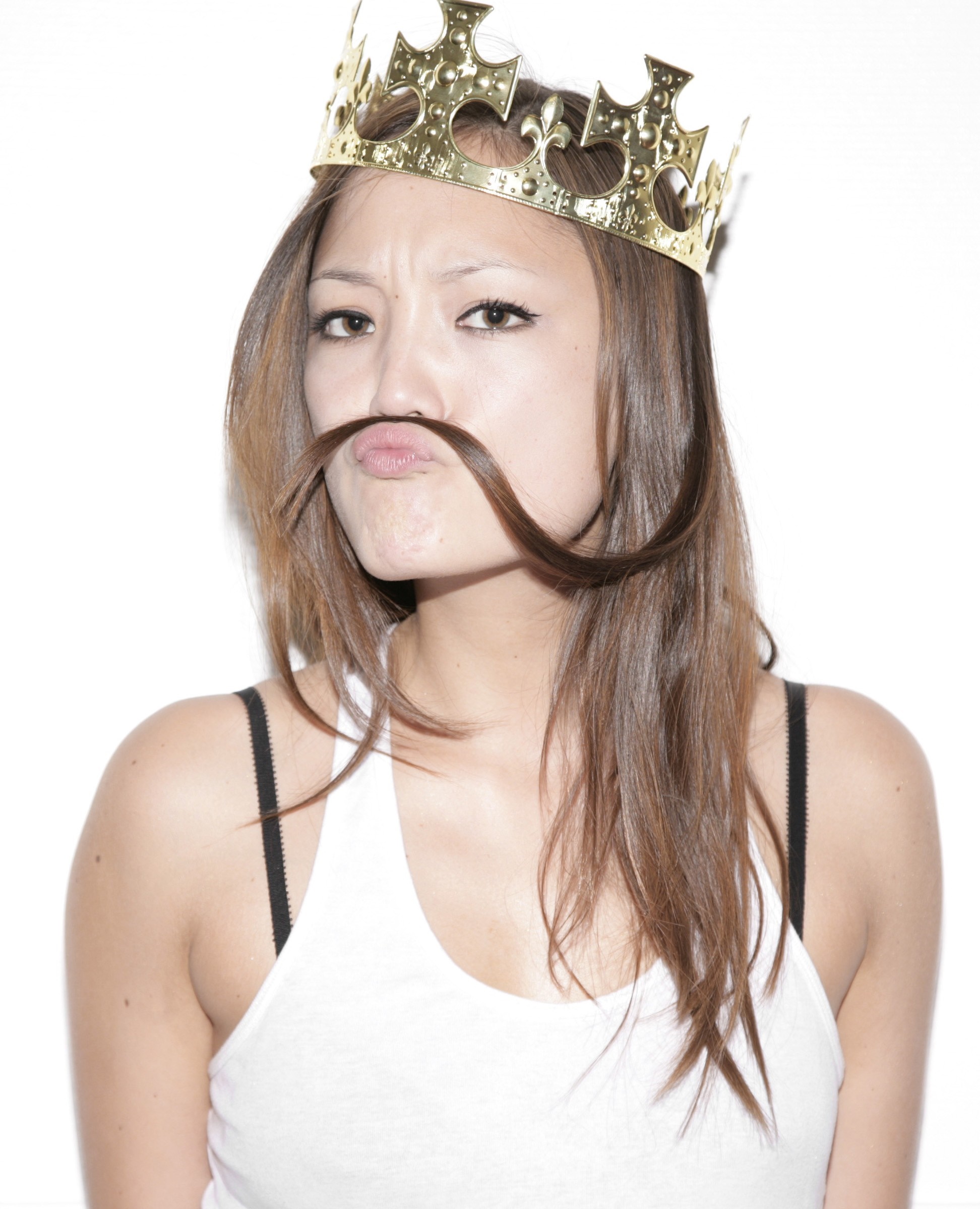 Woman wearing a crown with hair as mustache HD Wallpaper