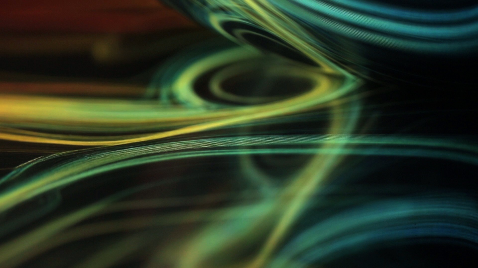 Abstract swirling lines of green and yellow light HD Wallpaper