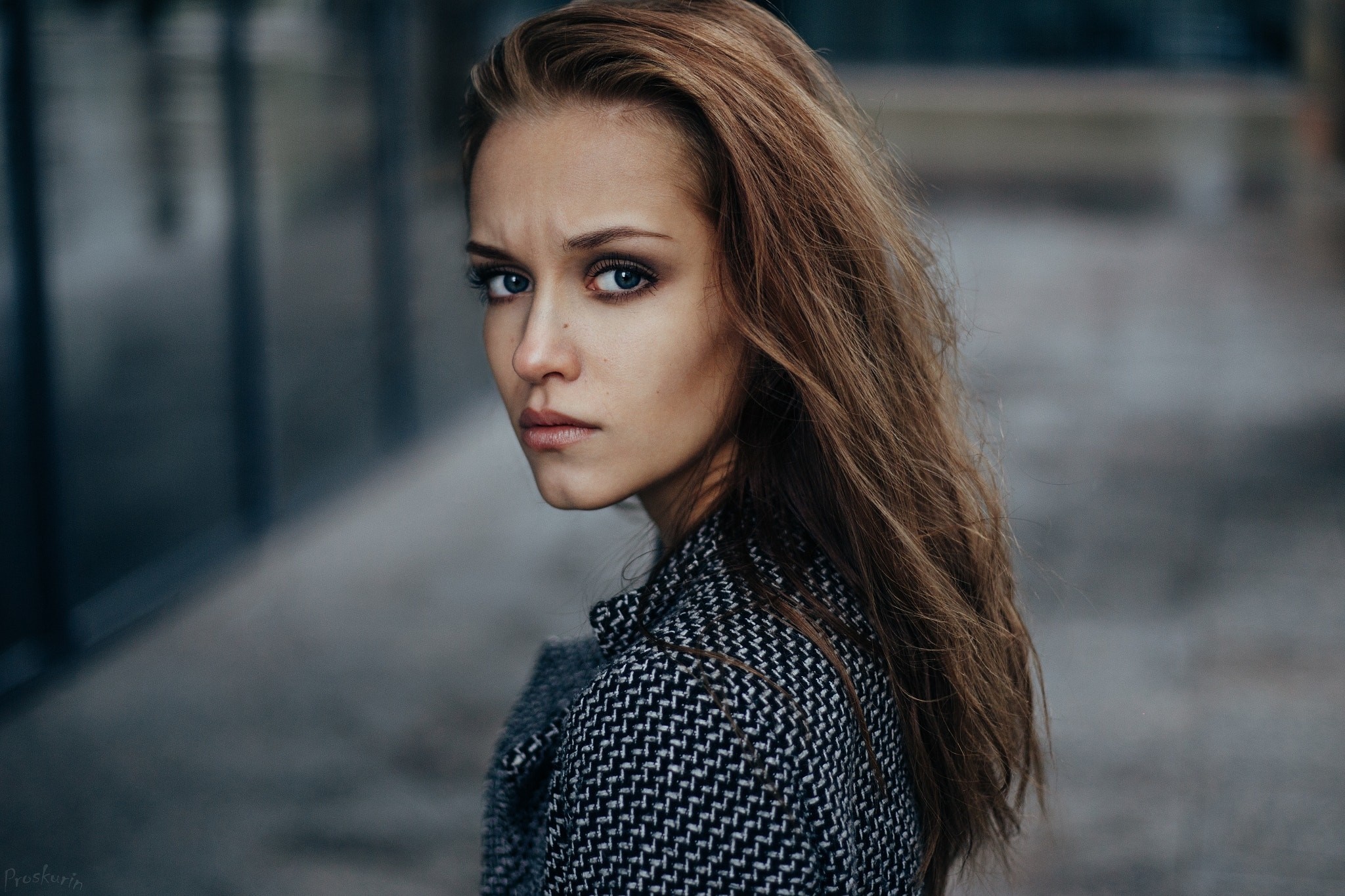 Woman with long brown hair wearing a patterned coat HD Wallpaper