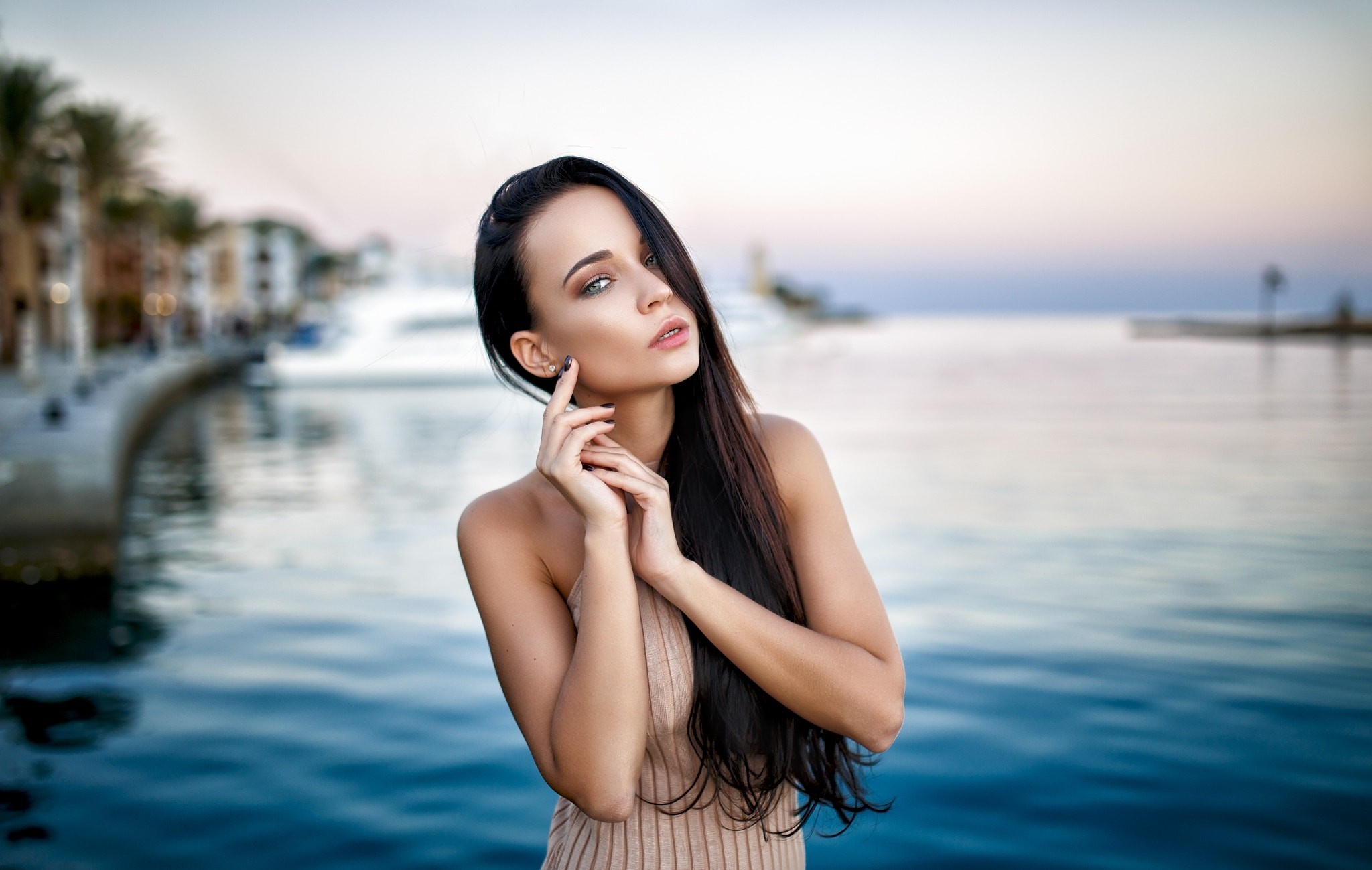 Sunlit Portrait of Woman by the Water HD Wallpaper