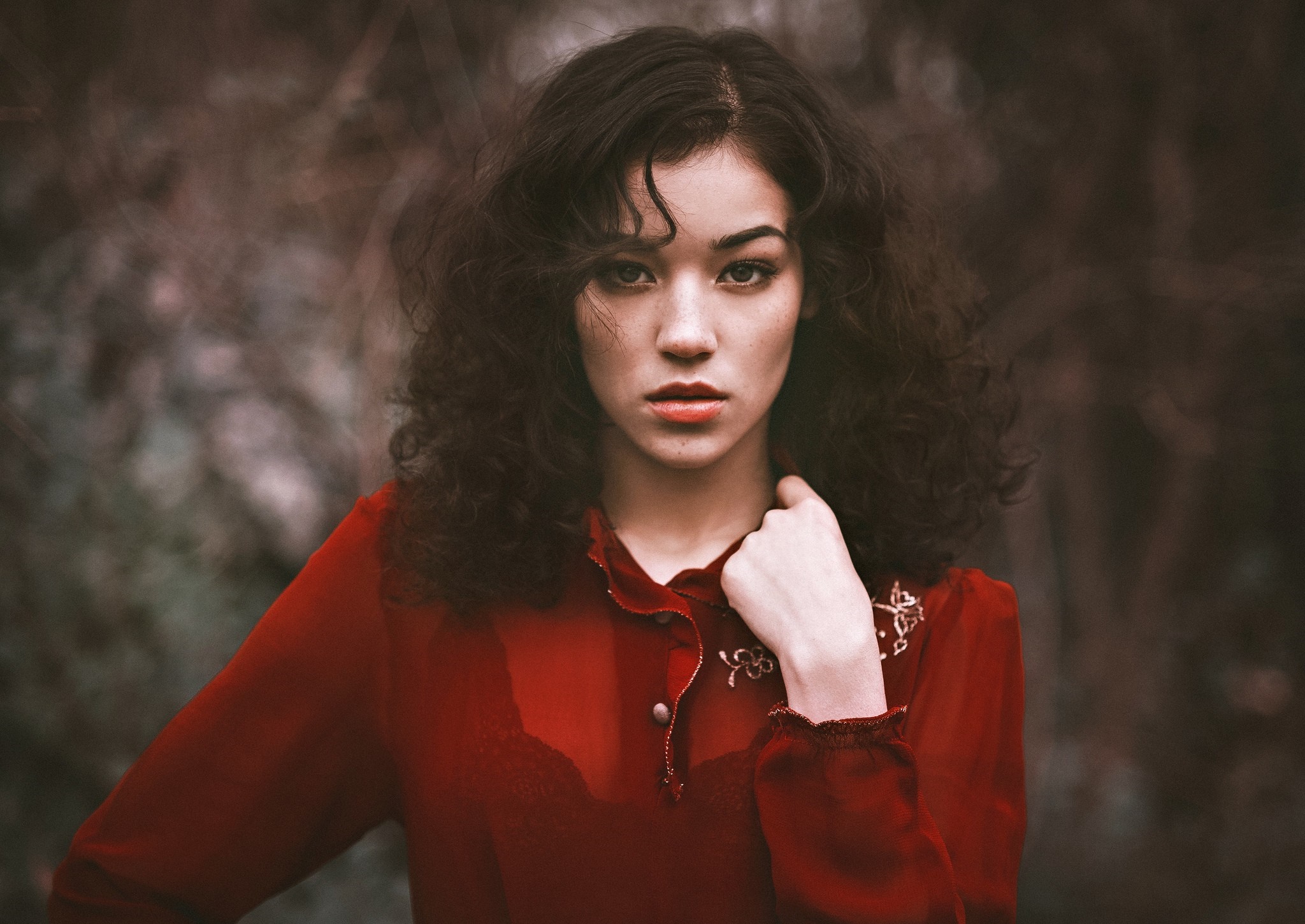 Woman with curly hair in a red top HD Wallpaper