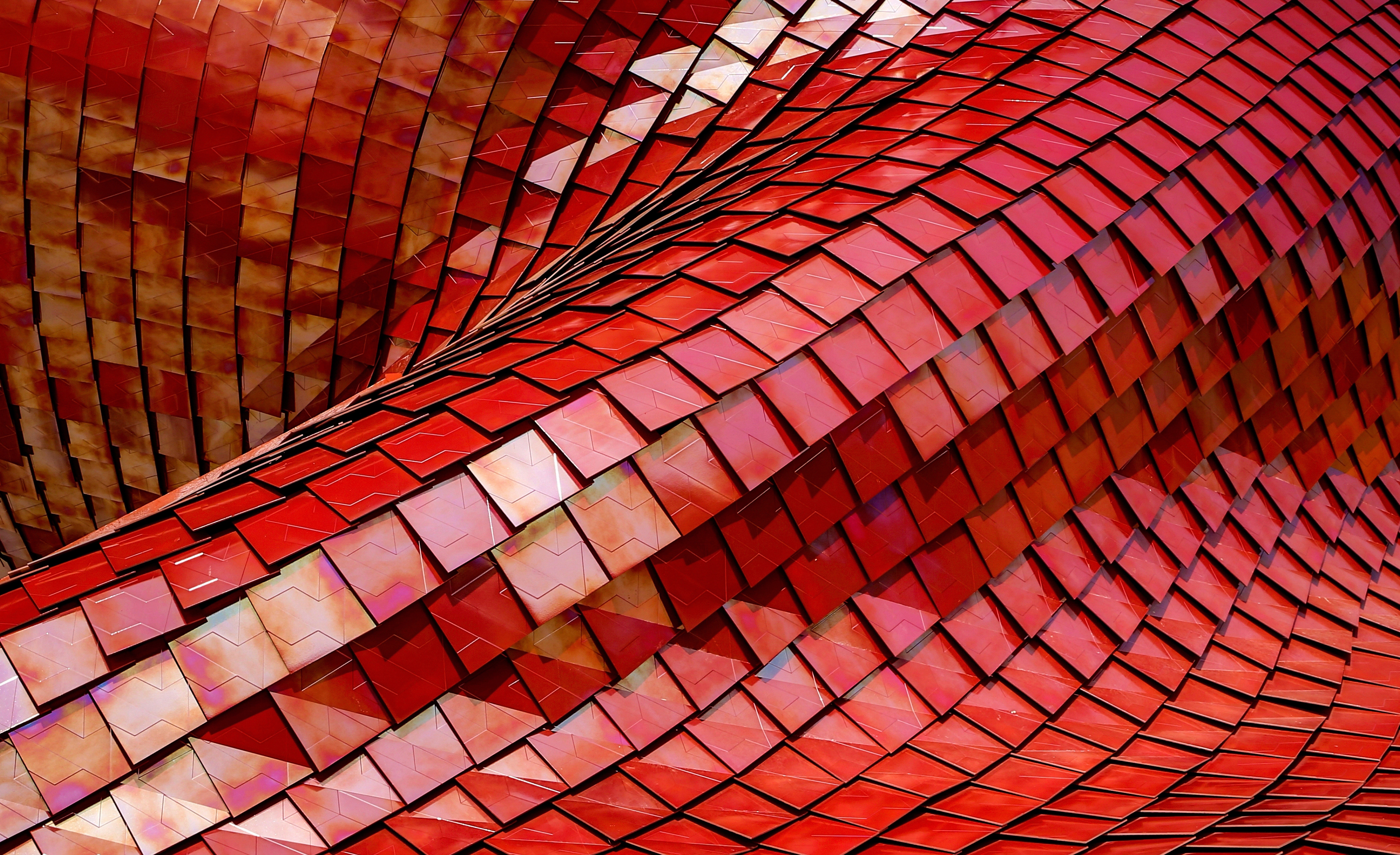 Red metallic scales forming a curved surface HD Wallpaper