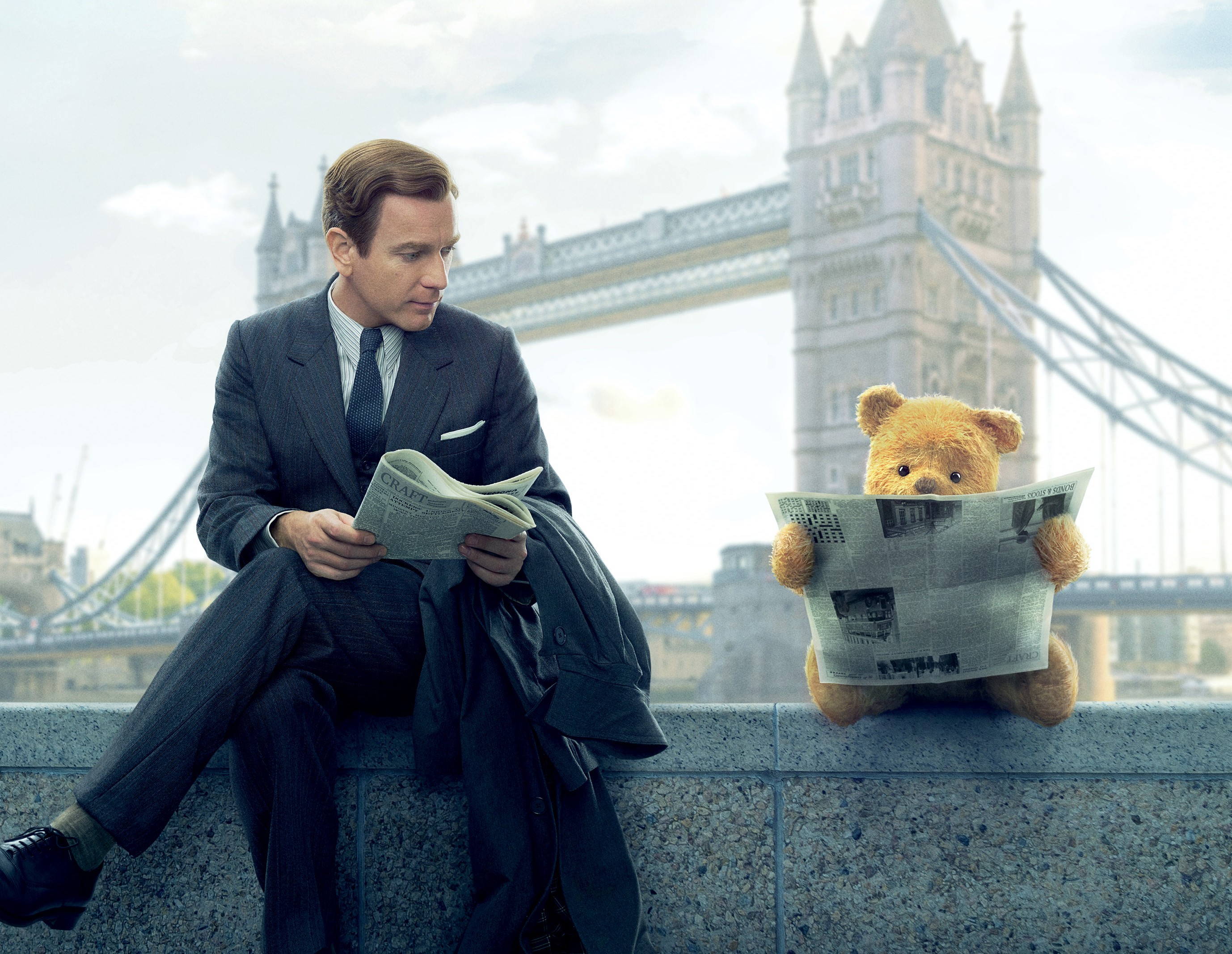 Ewan McGregor and Winnie the Pooh reading newspapers near Tower Bridge HD Wallpaper