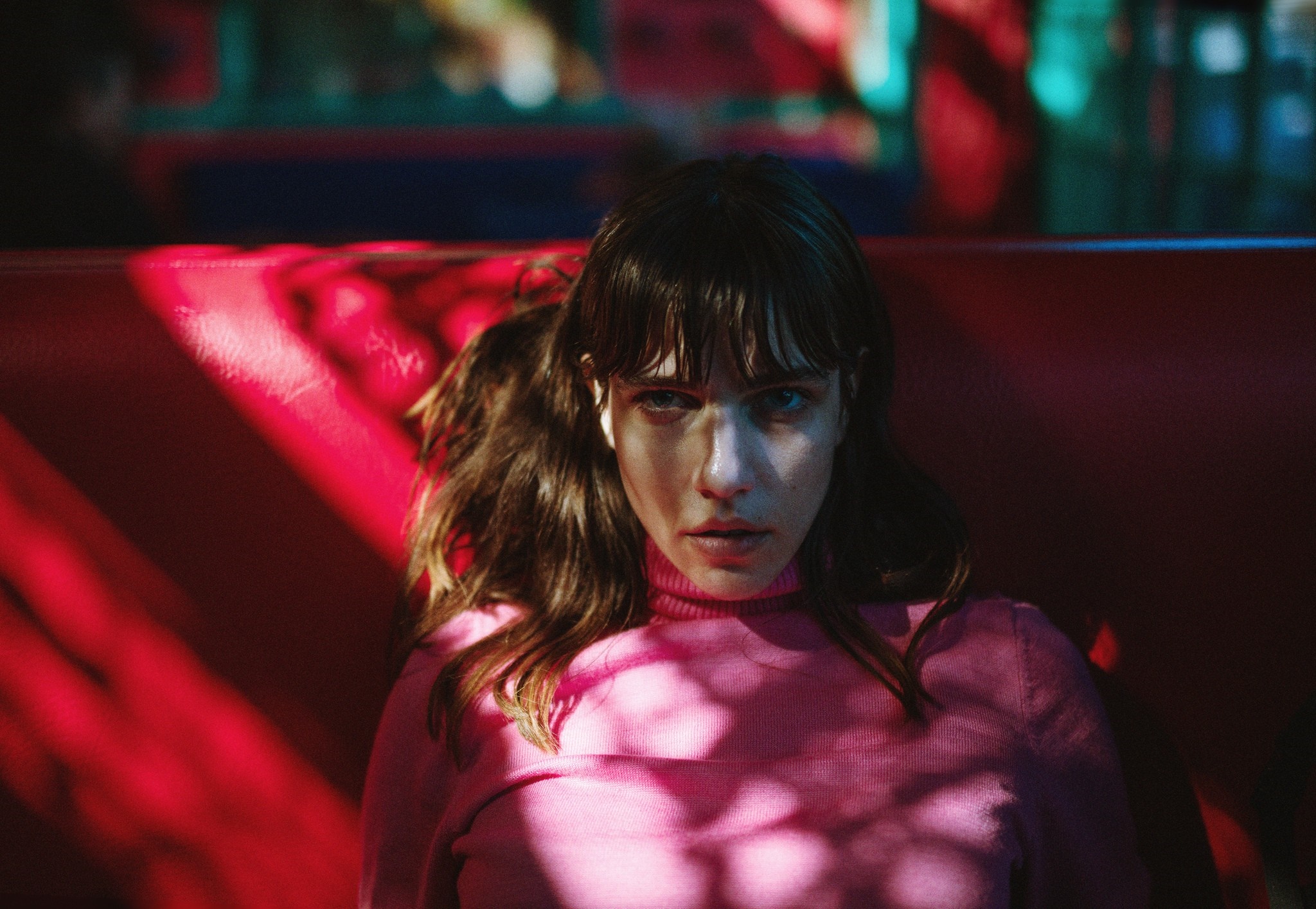 Woman in pink turtleneck with bangs HD Wallpaper
