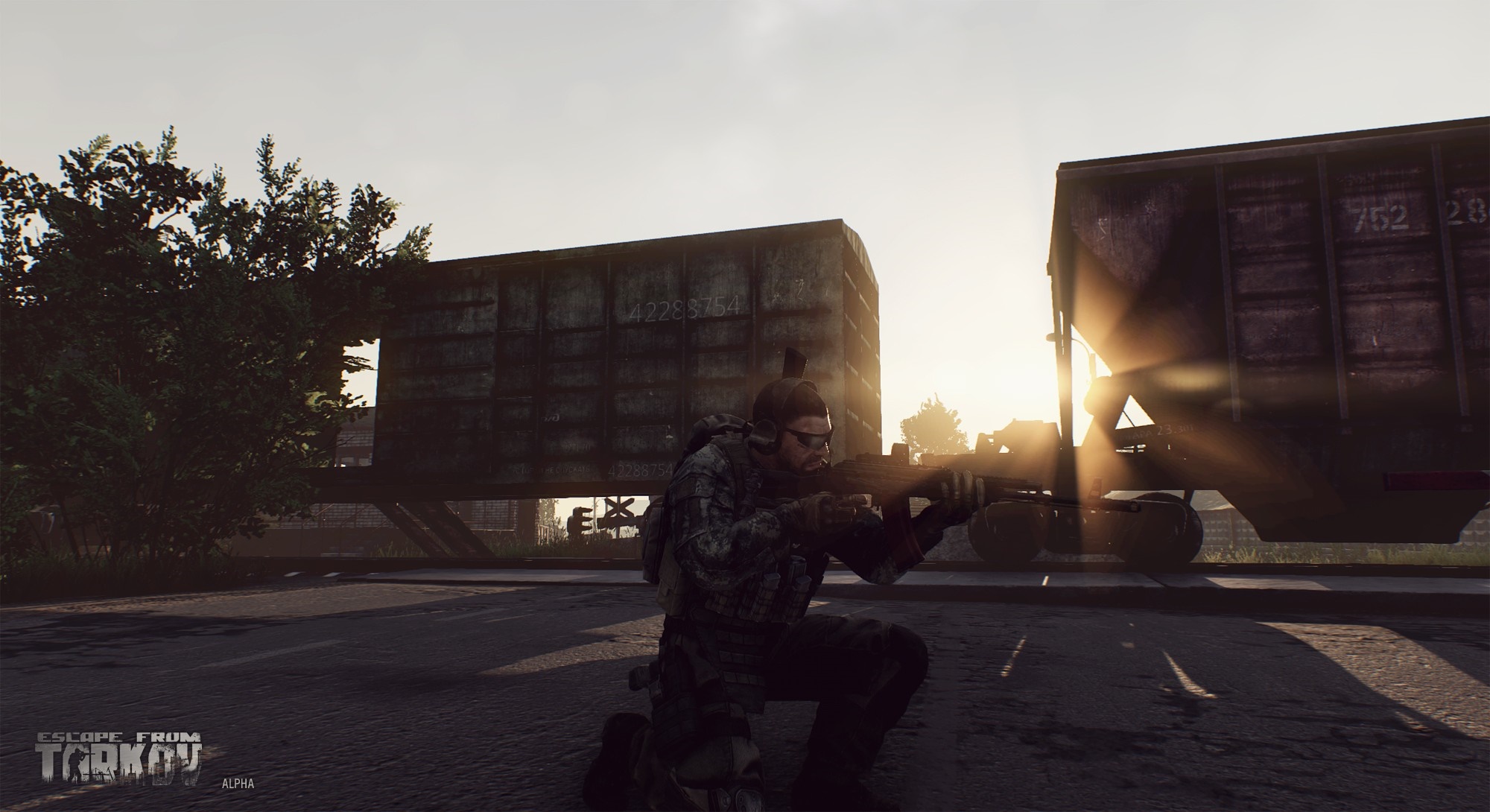Soldier aiming rifle near train cars in Escape from Tarkov HD Wallpaper