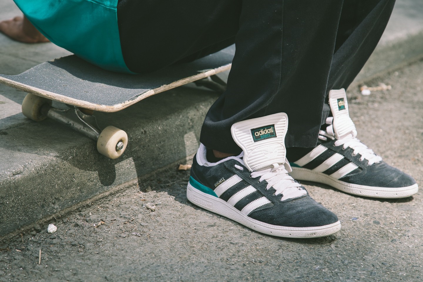 Person wearing Adidas sneakers on a skateboard HD Wallpaper
