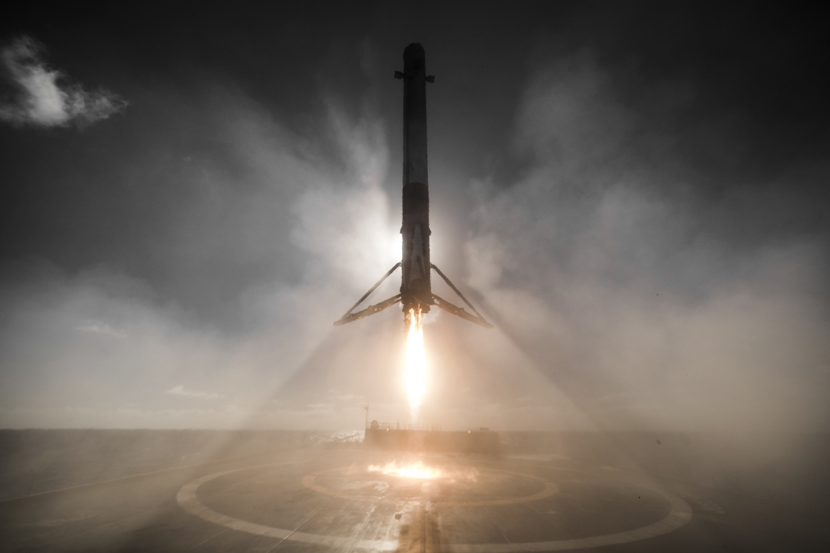 SpaceX Falcon 9 rocket landing at night HD Wallpaper