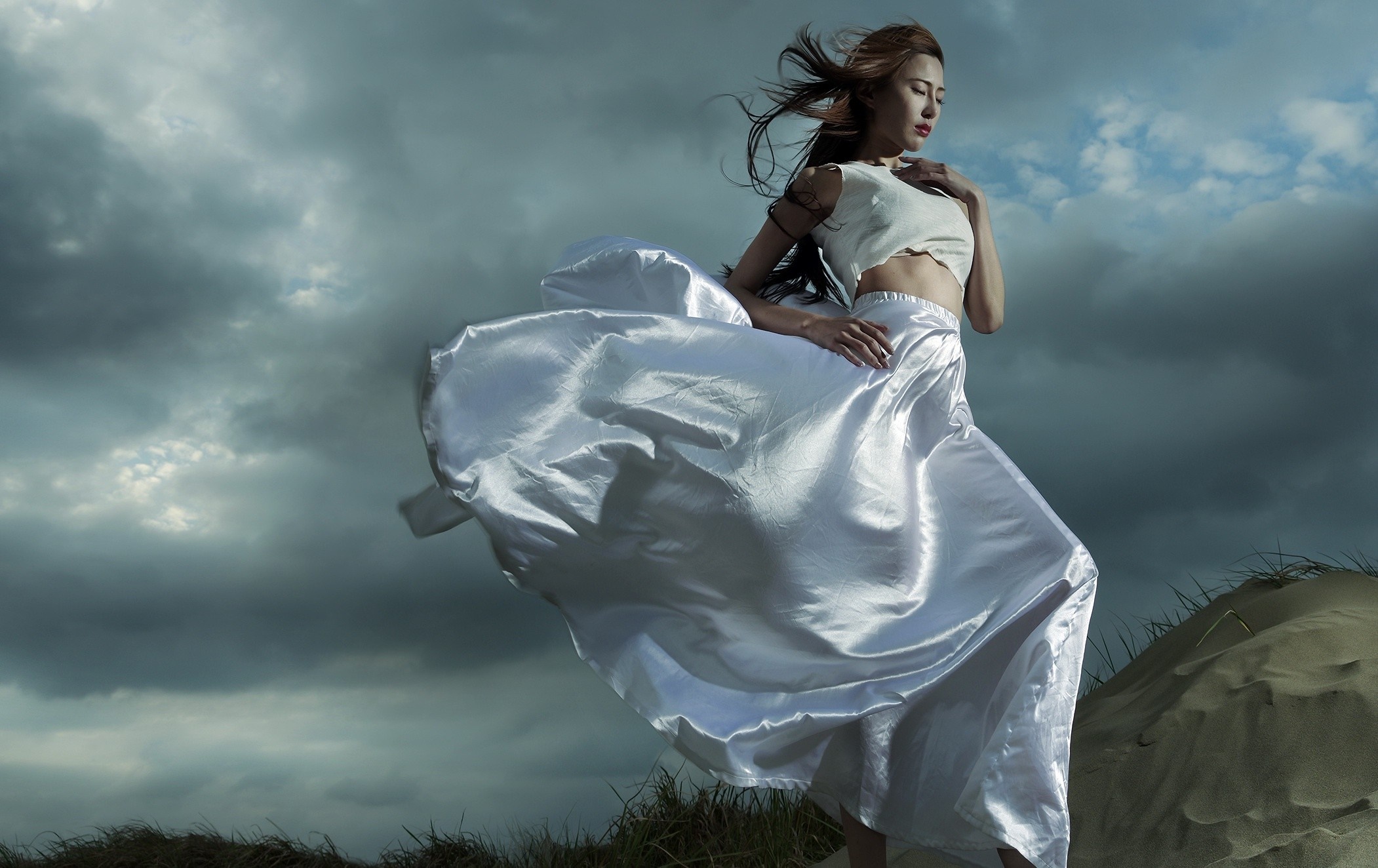 Woman in white dress on sand dunes HD Wallpaper