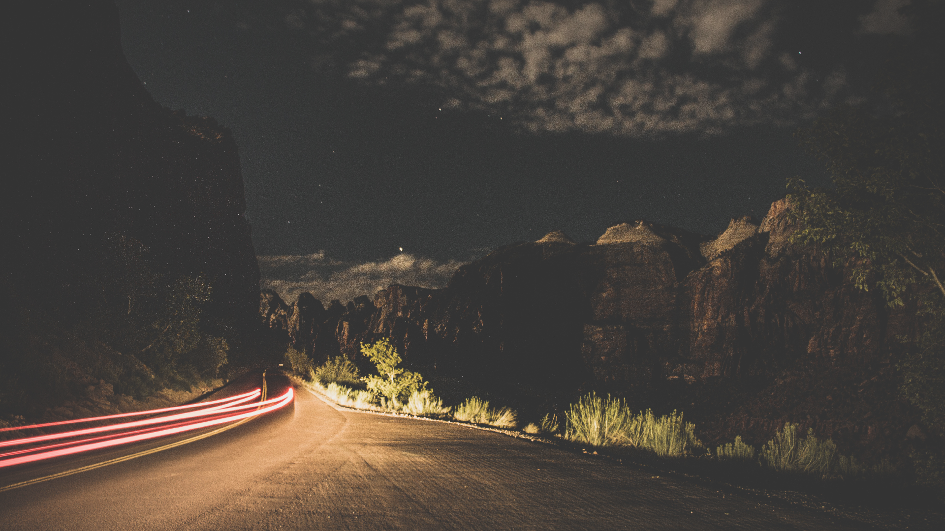 Night road with light trails and mountains HD Wallpaper