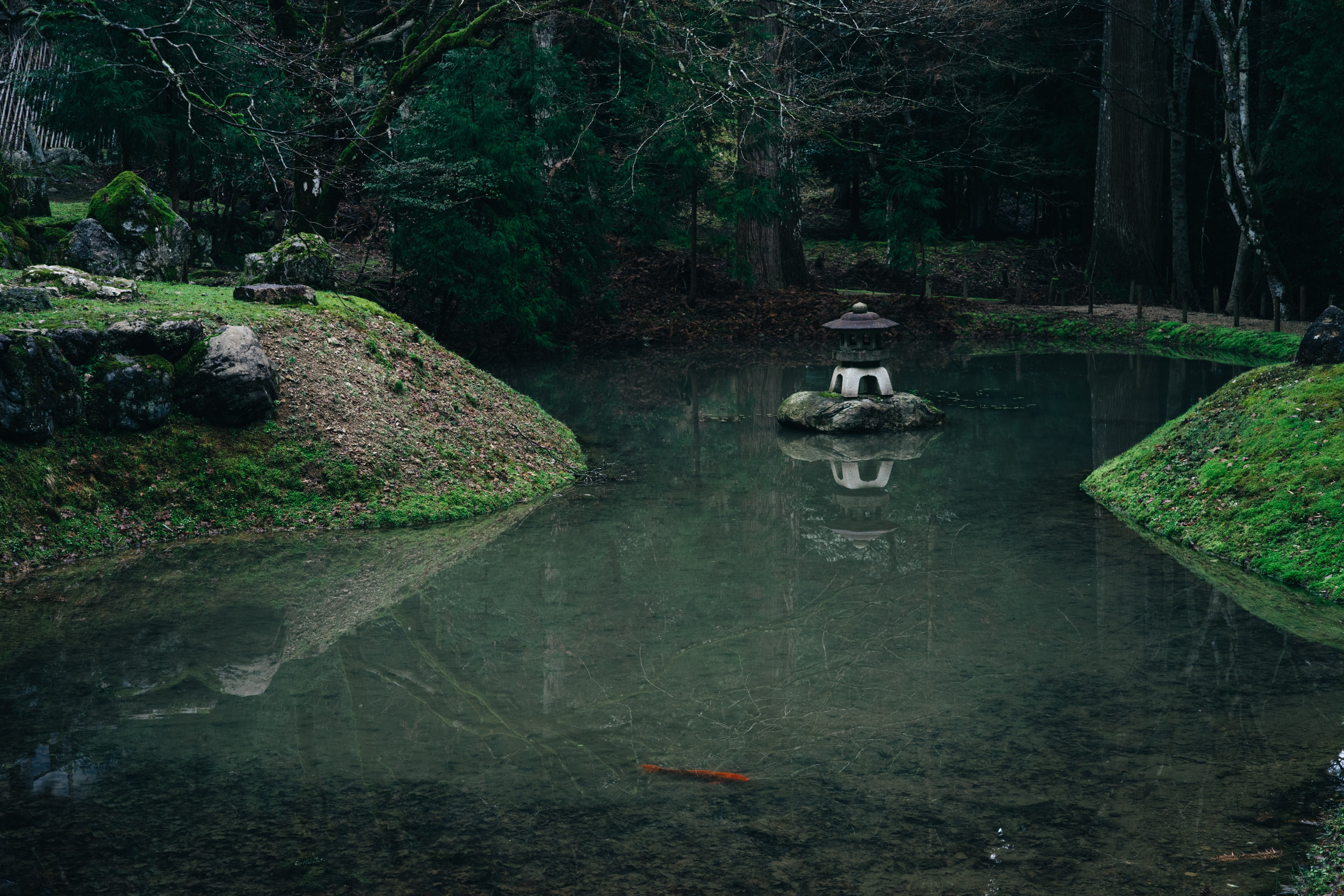 Japanese garden with stone lantern in pond HD Wallpaper