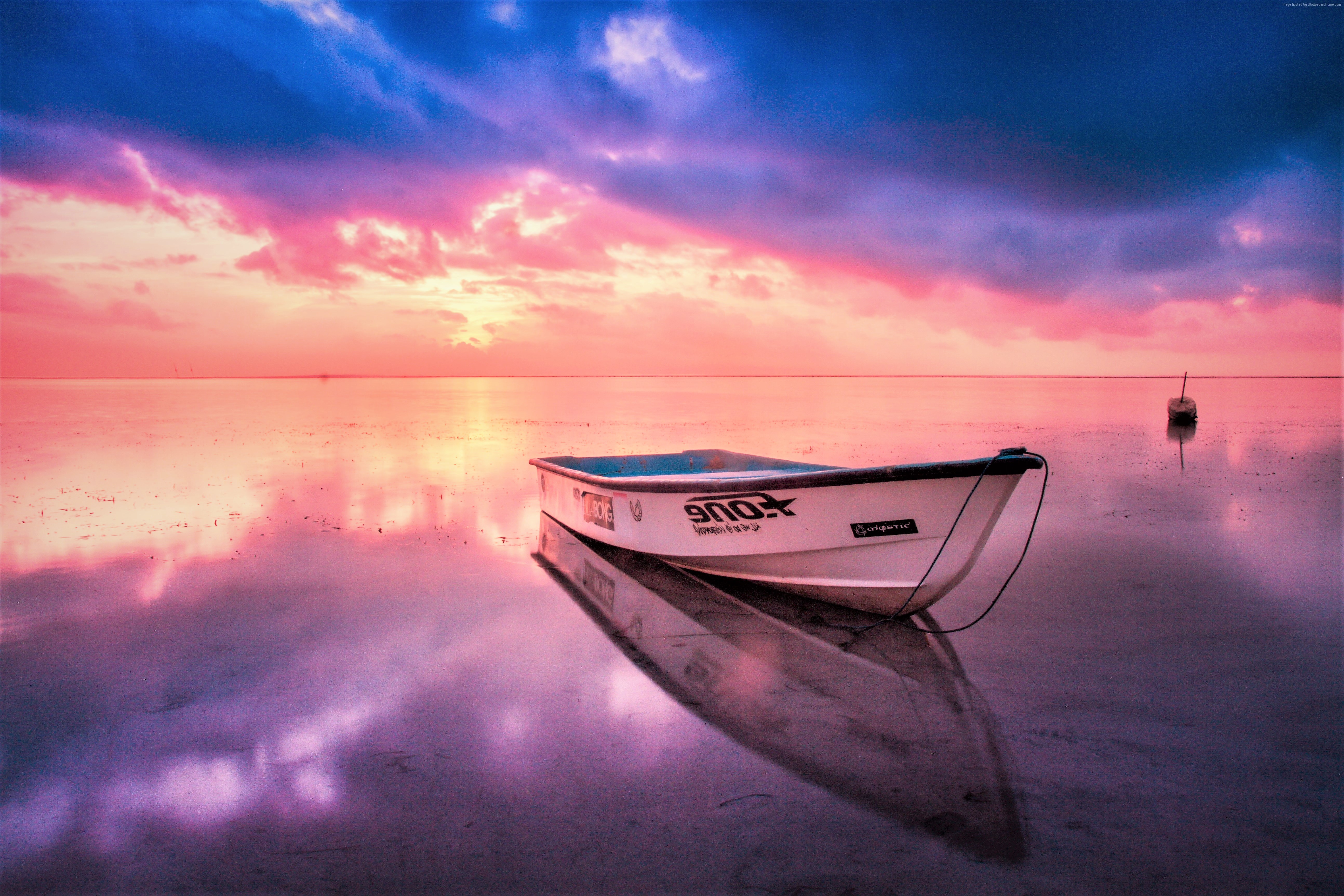 Boat on calm water during sunset HD Wallpaper