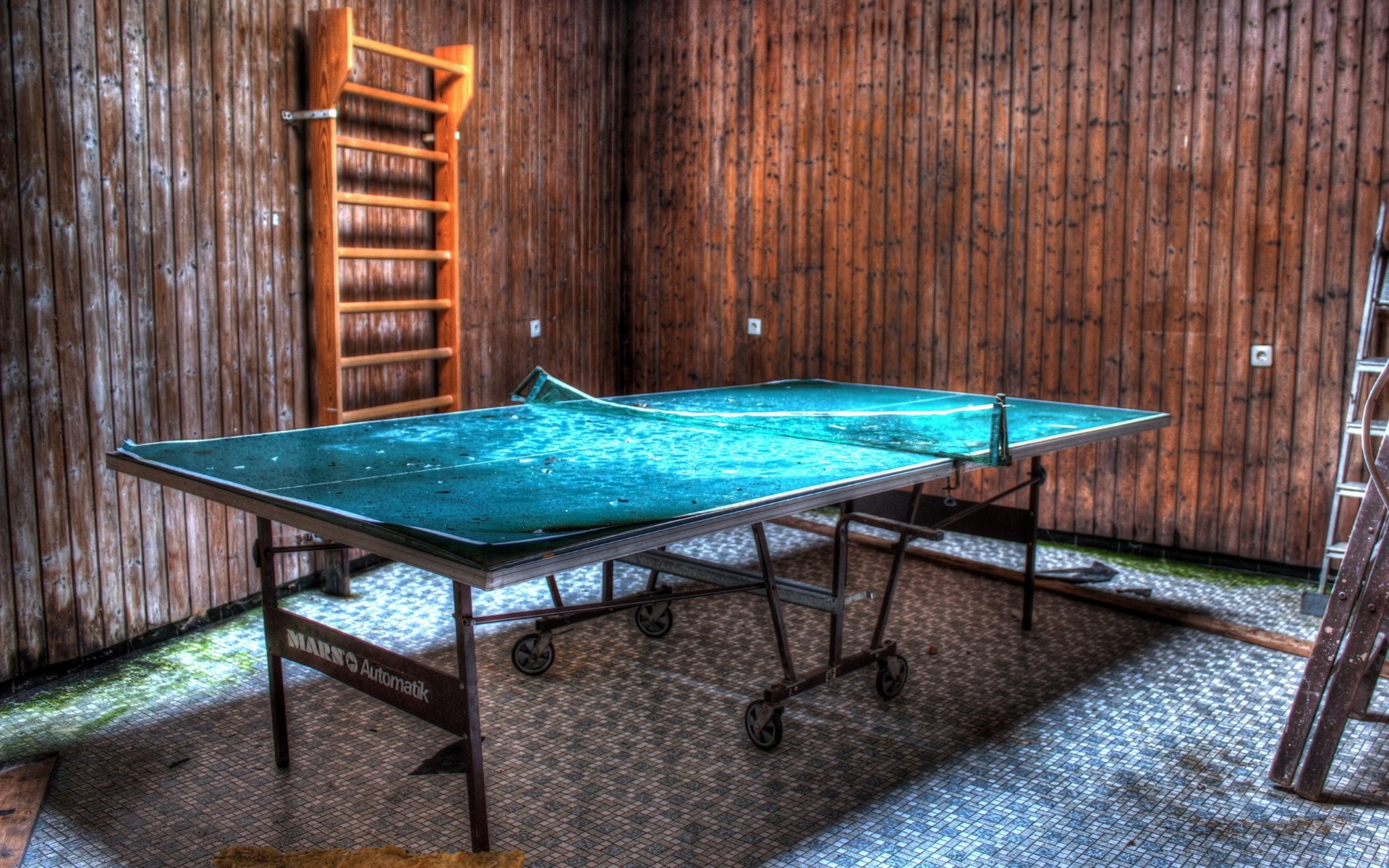 Abandoned room with ping pong table and ladder HD Wallpaper