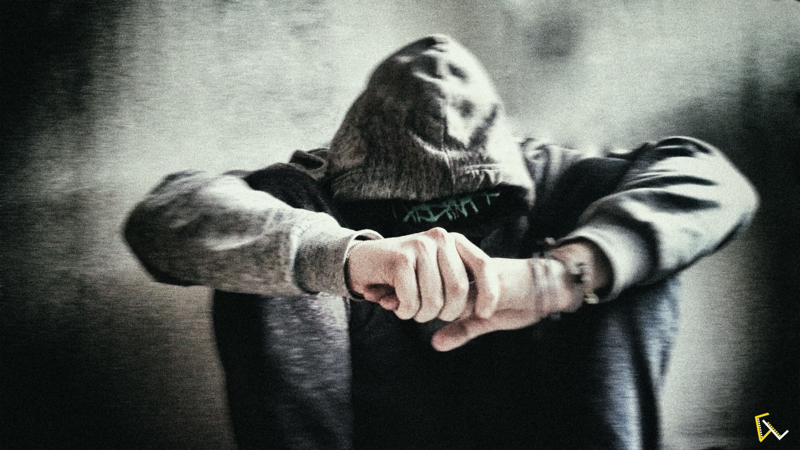 Person in hoodie with hands clasped HD Wallpaper
