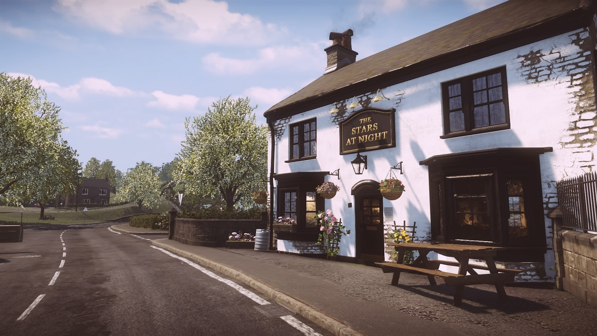 The Stars At Night pub on a village street HD Wallpaper
