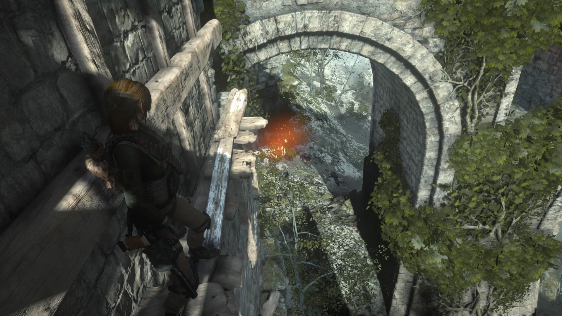 Lara Croft from Tomb Raider on a stone ledge HD Wallpaper