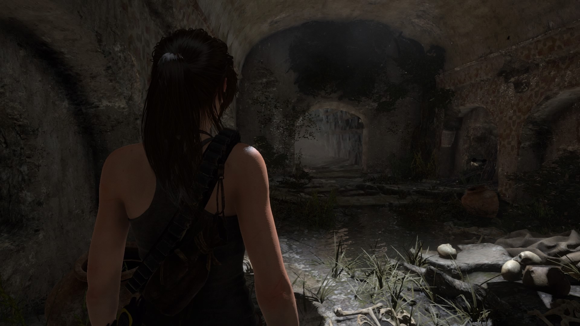 Lara Croft in a dark ancient tomb HD Wallpaper