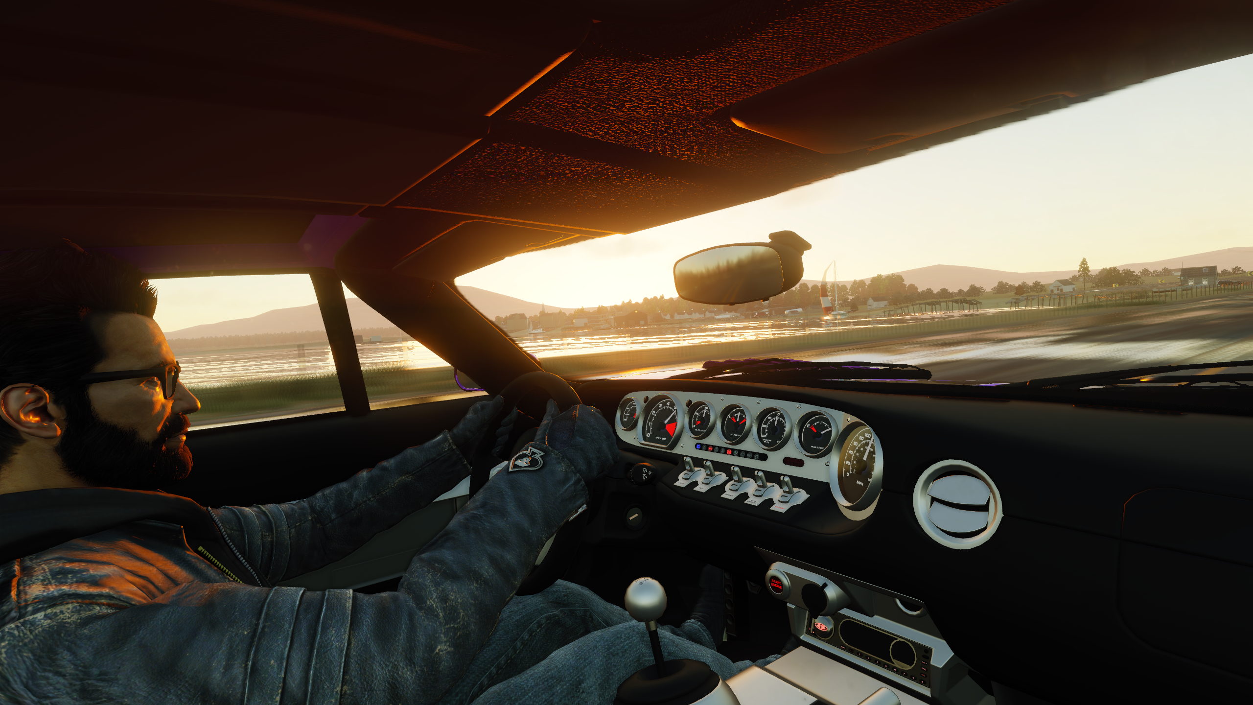 Man driving a Ford GT 2005 during sunset HD Wallpaper