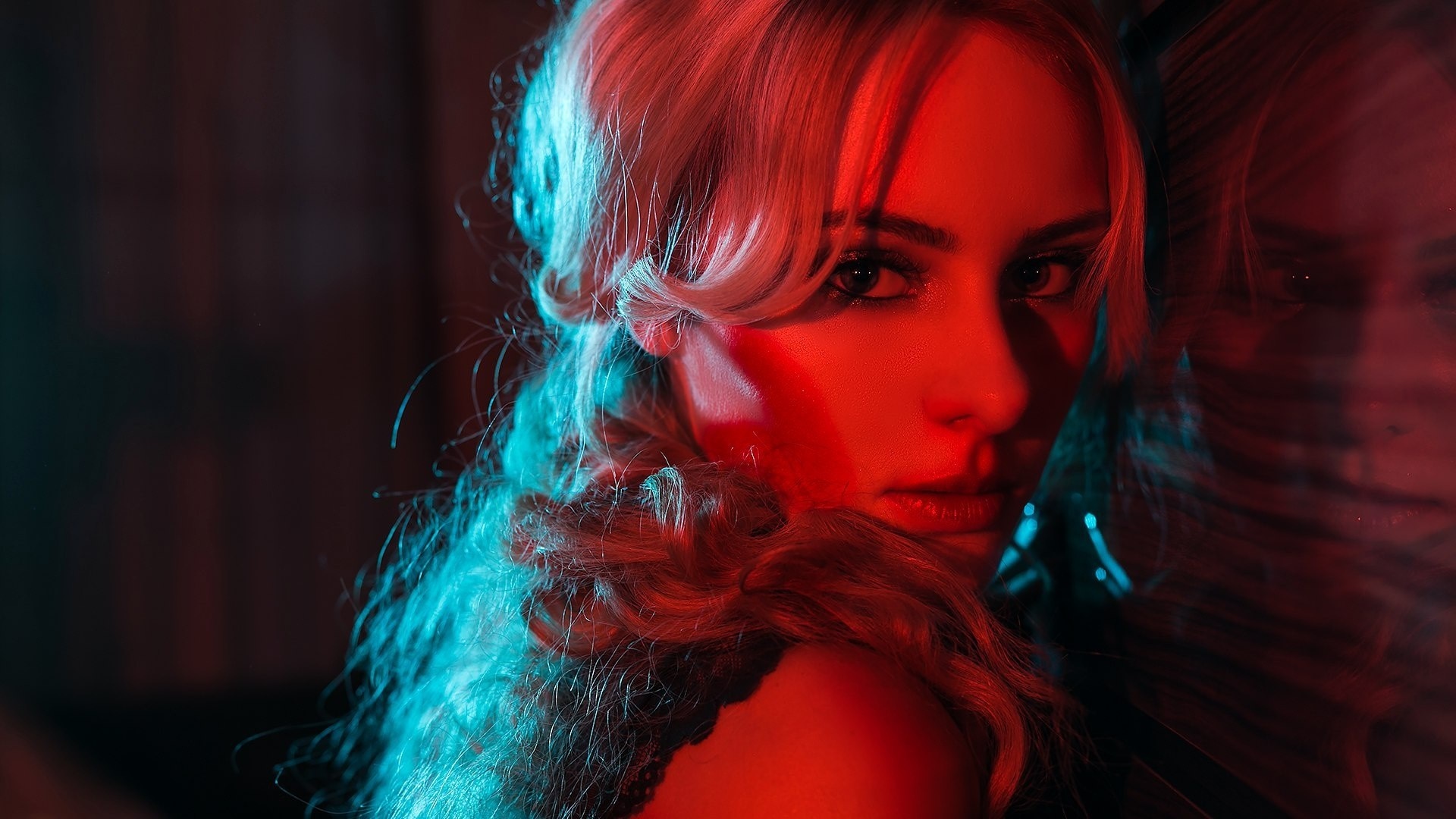 Woman with blonde hair in red and blue lighting HD Wallpaper