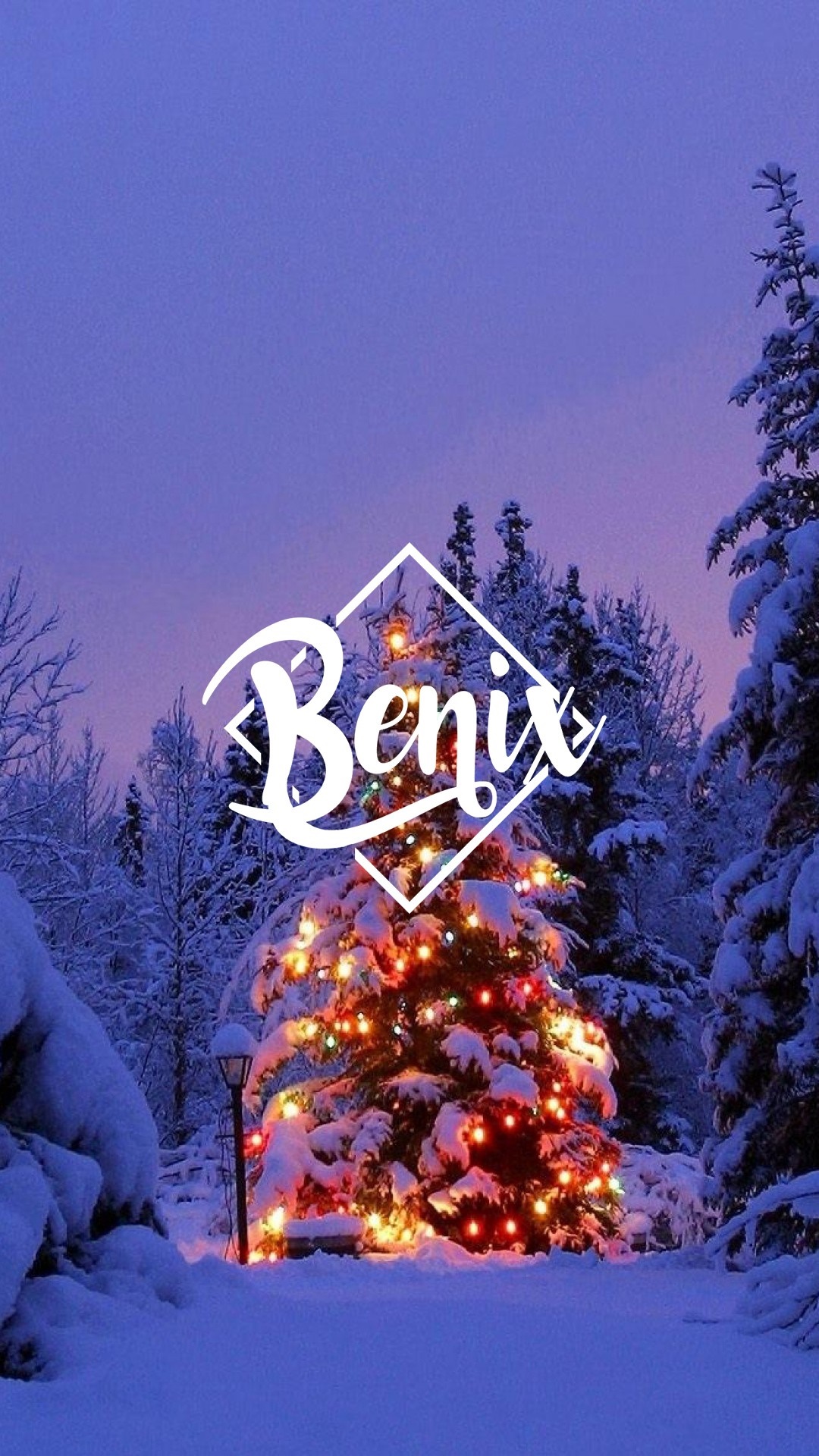 Christmas tree with lights in a snowy forest HD Wallpaper