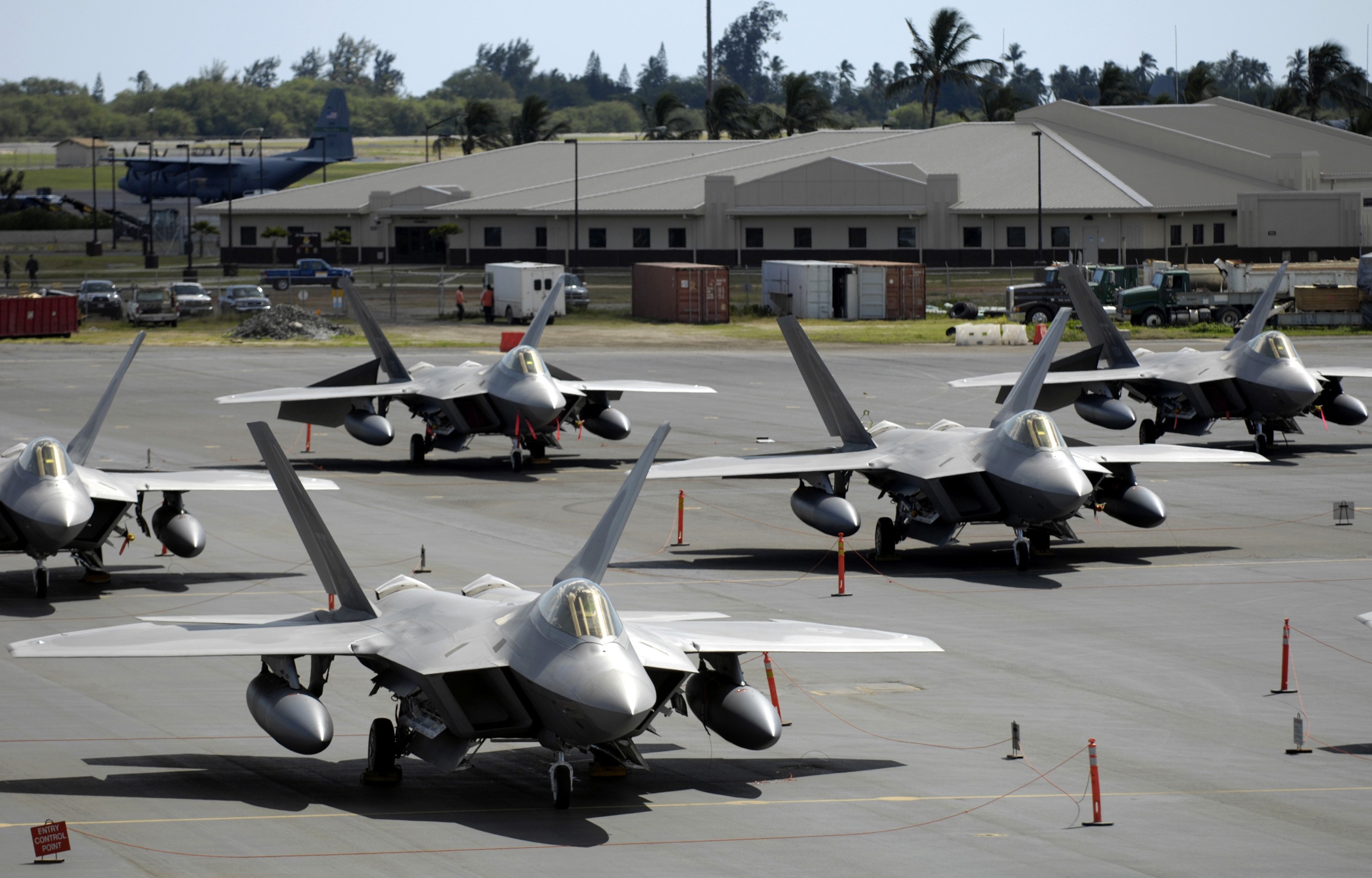 Lockheed Martin F-22 Raptors on an Airfield HD Wallpaper