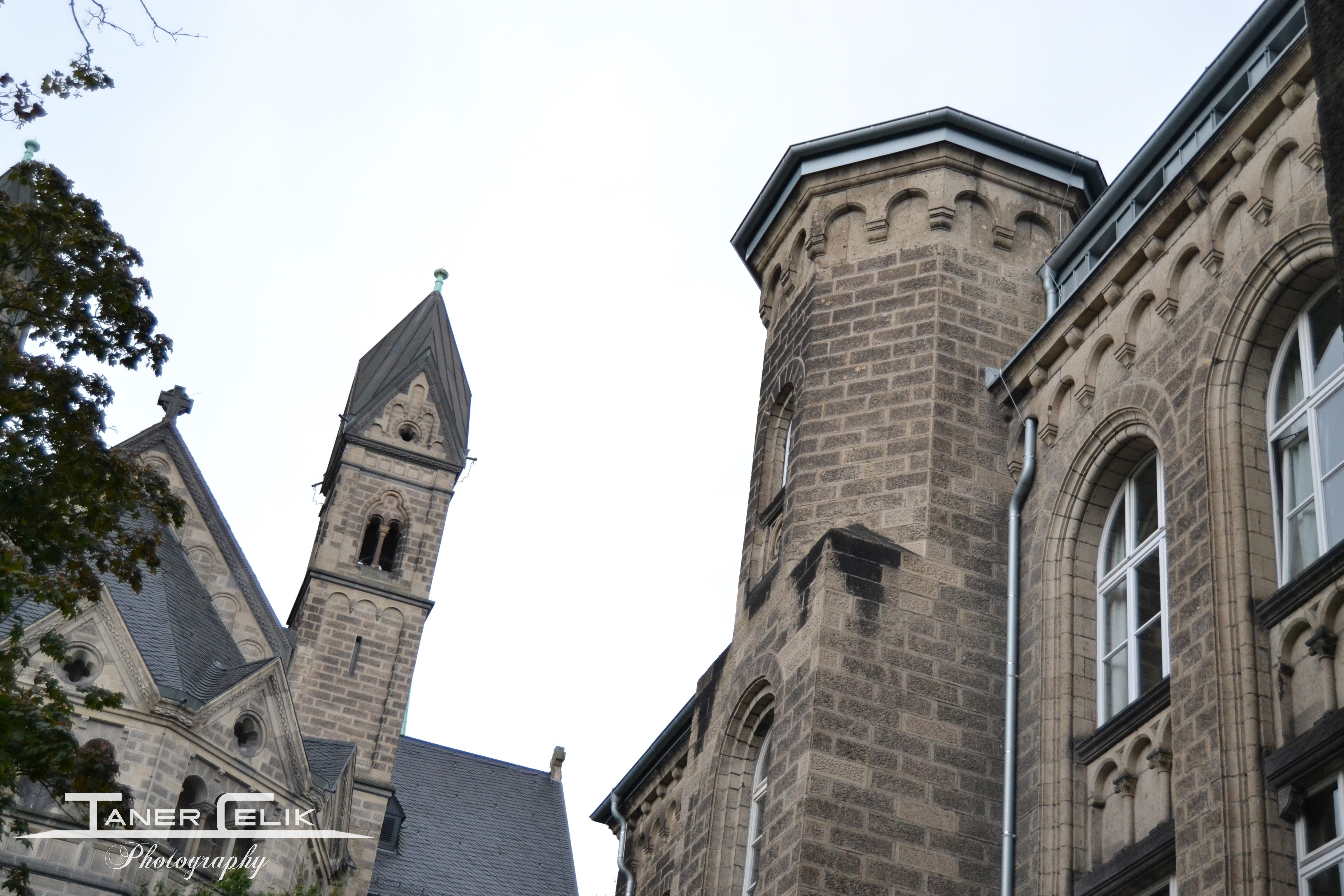 Church tower and building facade HD Wallpaper