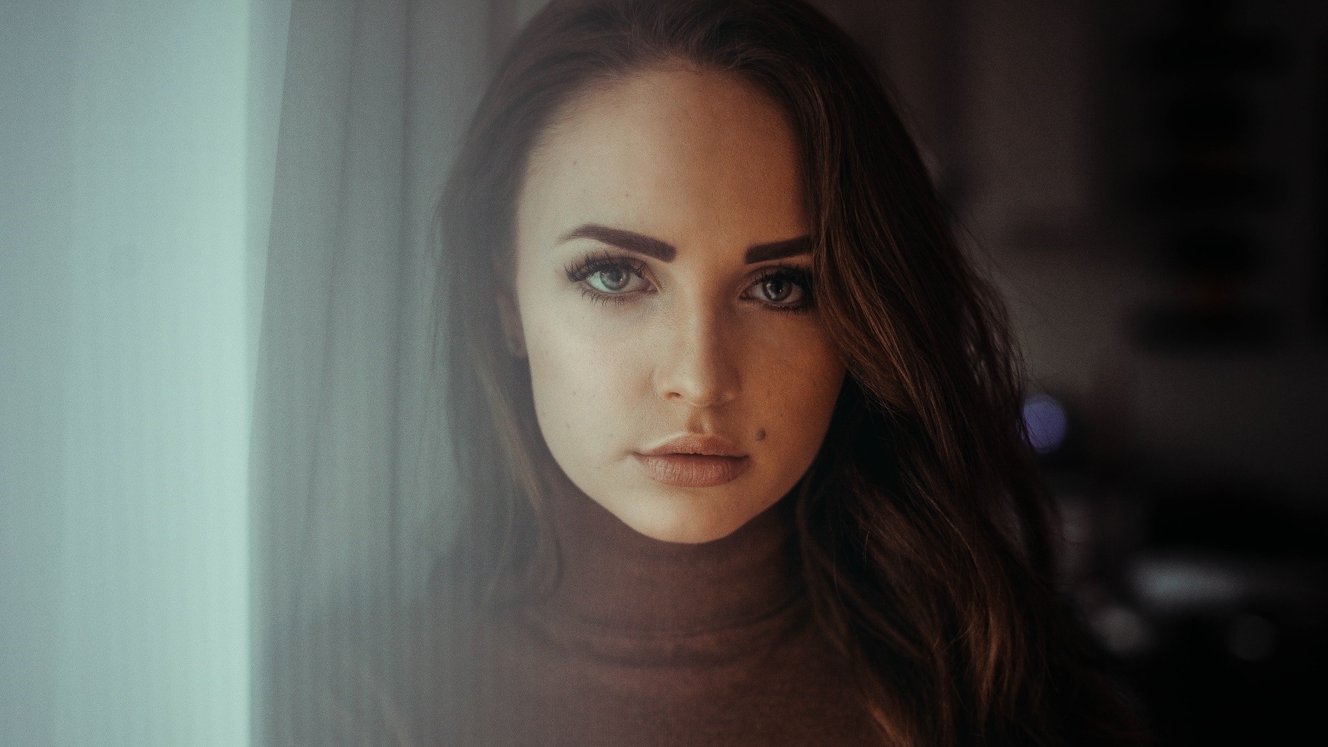 Woman with long brown hair wearing a turtleneck HD Wallpaper