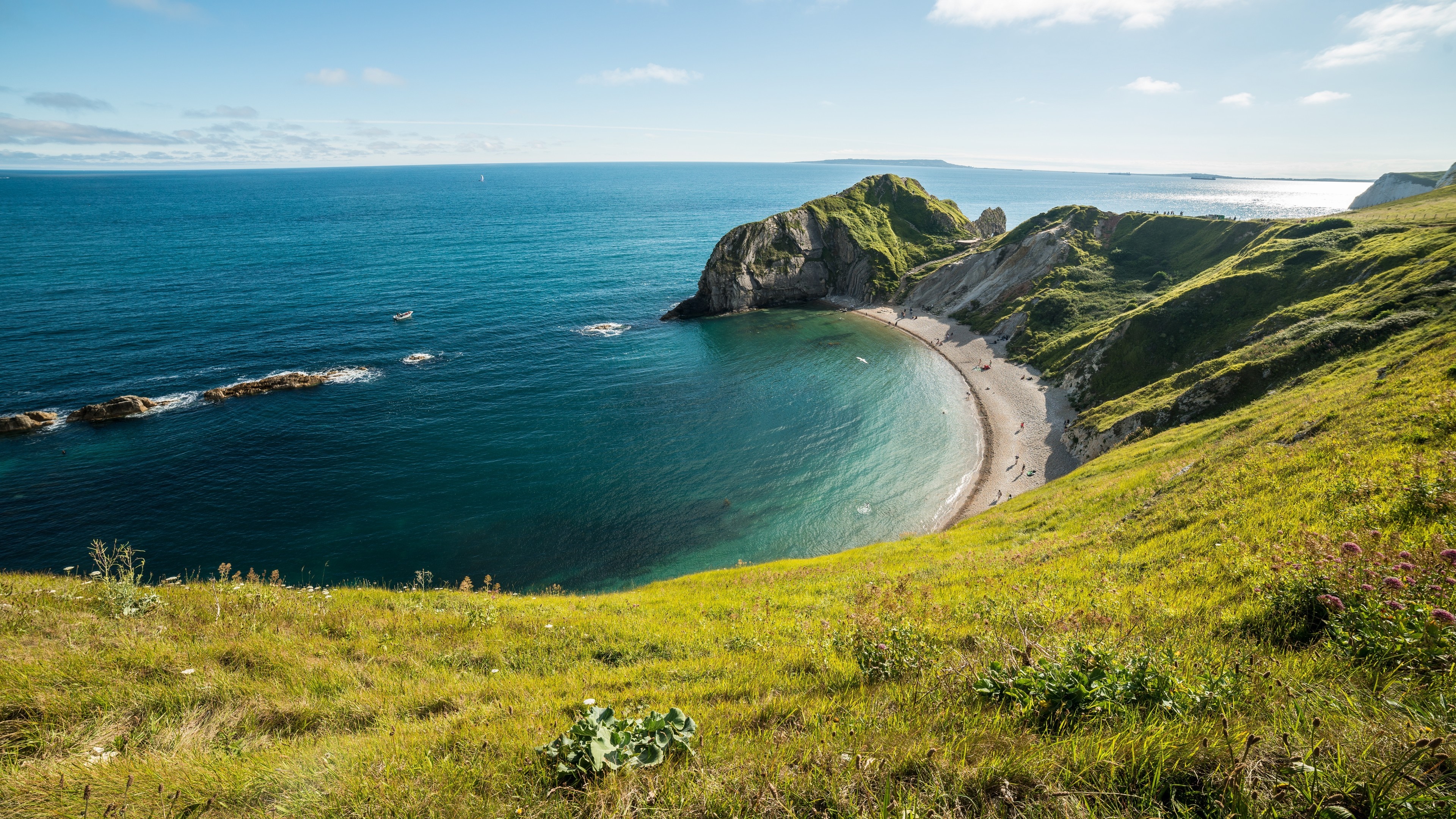 Bay and cliffs on the coast of Dorset, England HD Wallpaper