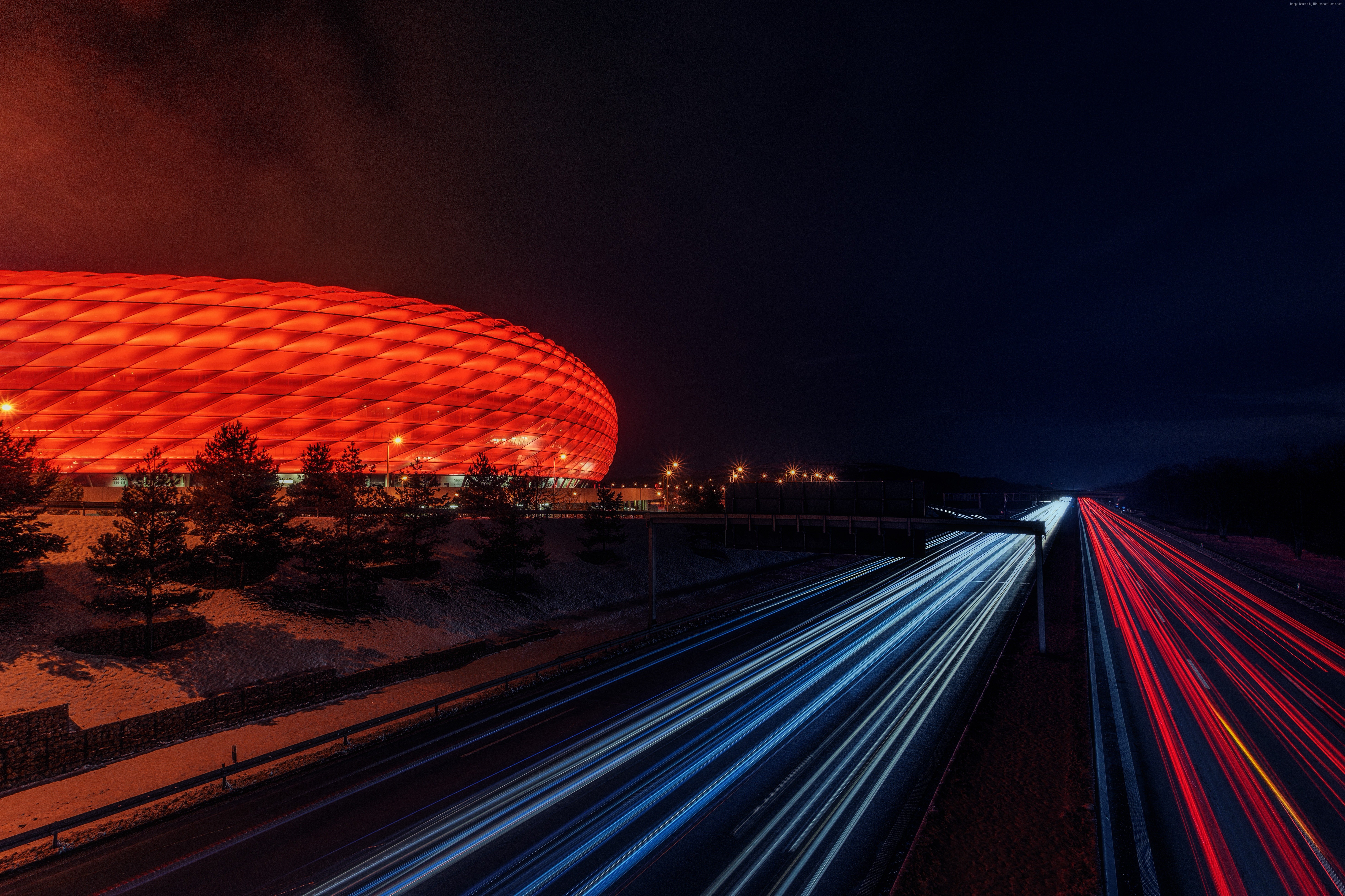 Allianz Arena at Night with Light Trails on Highway HD Wallpaper