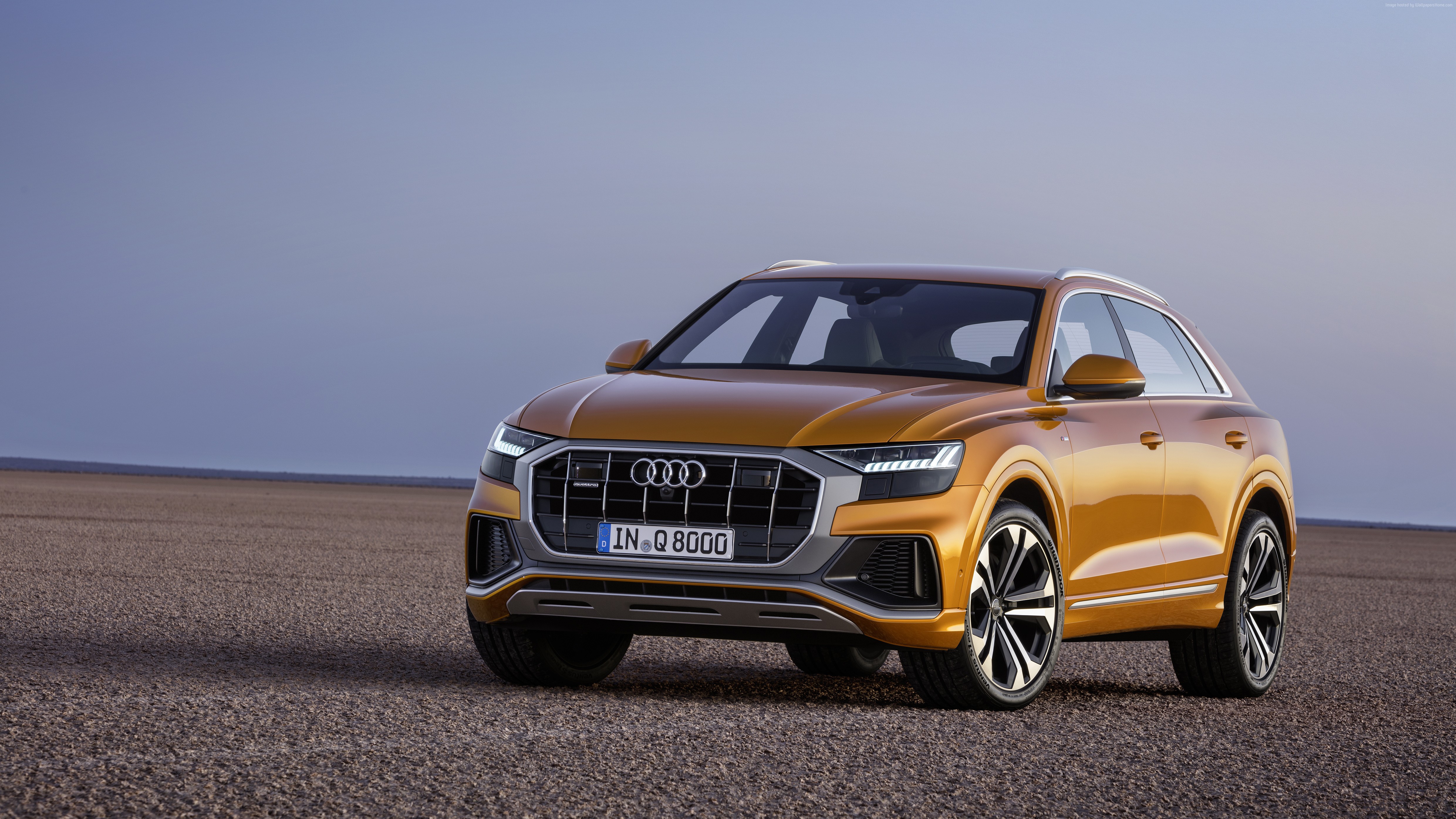 Audi Q8 SUV in a desert landscape HD Wallpaper