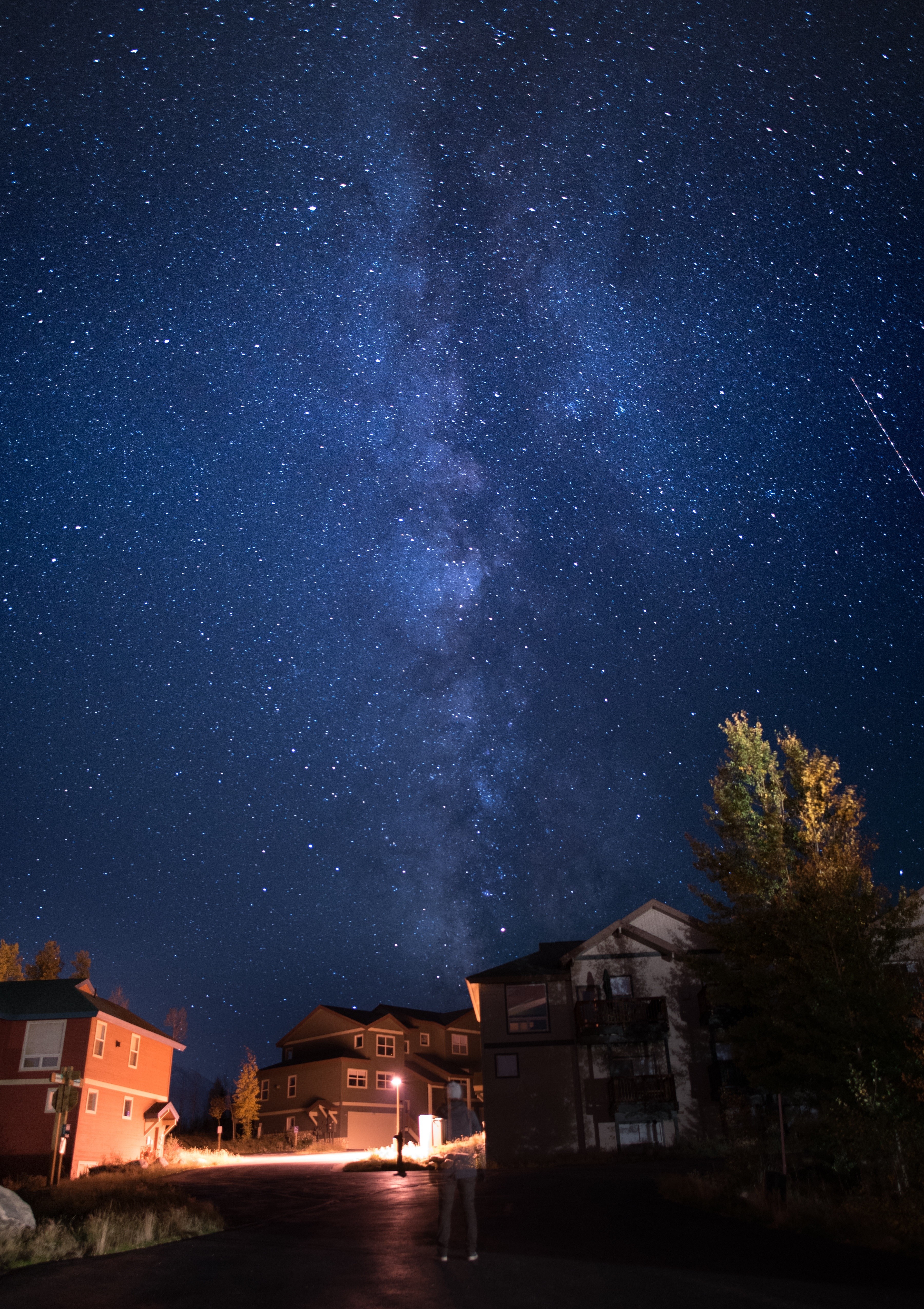 Milky Way over houses at night HD Wallpaper