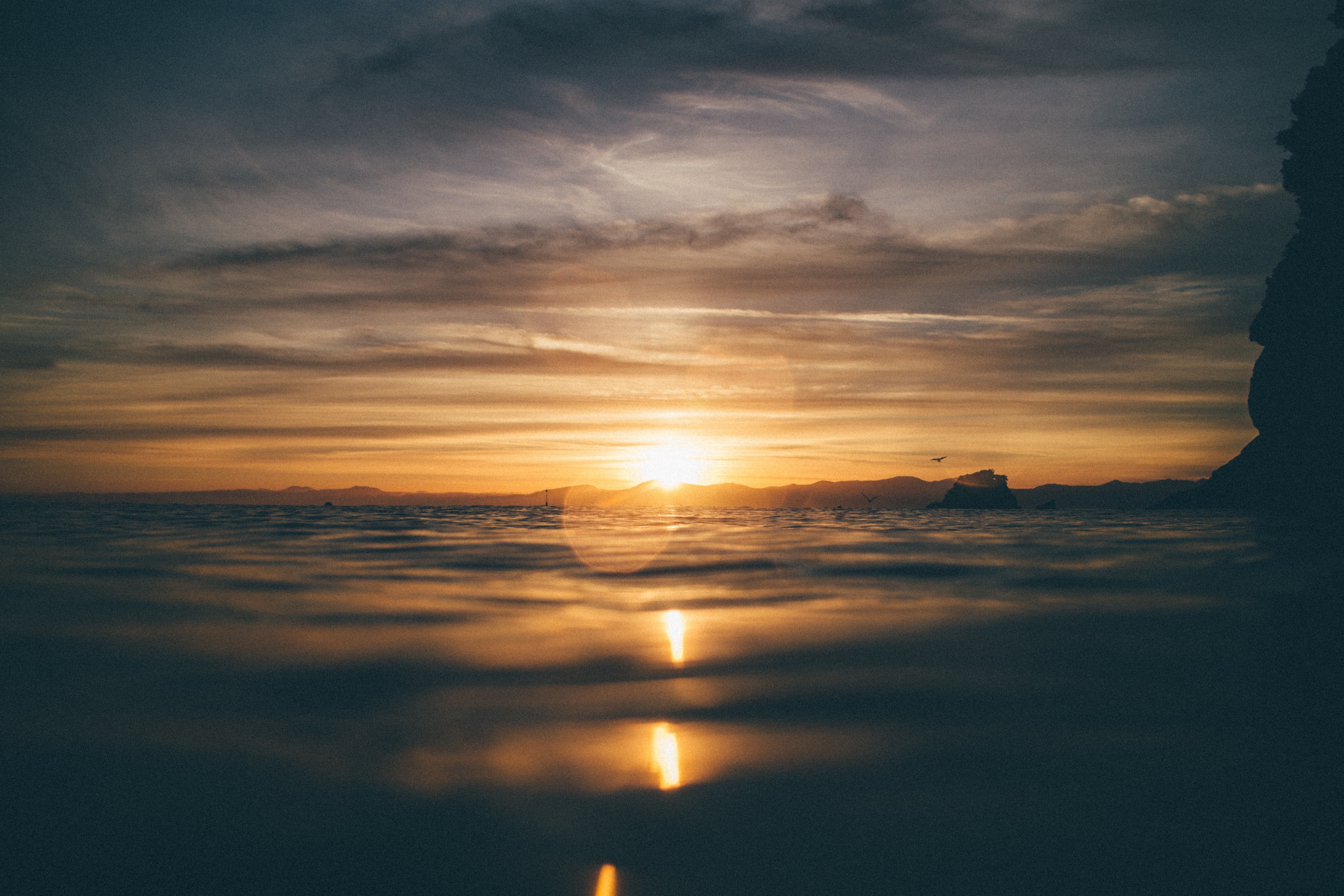 Sunset over the sea with reflection HD Wallpaper