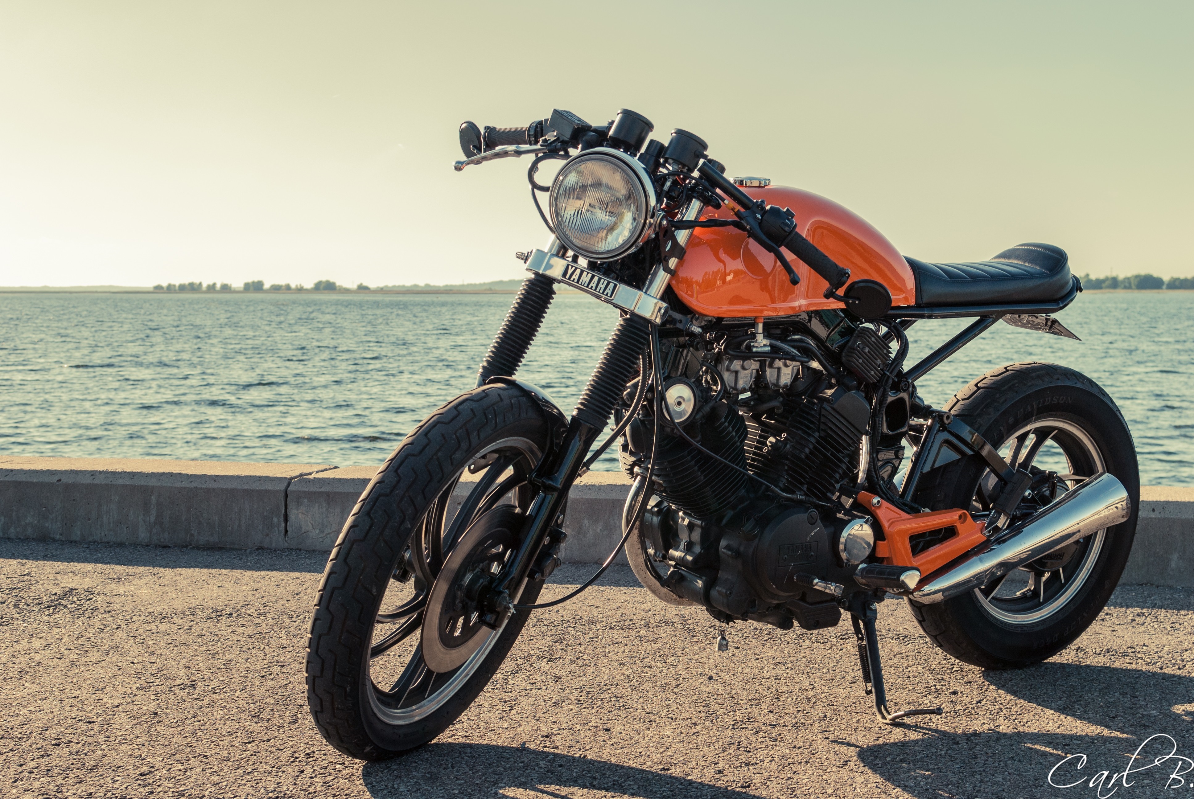 Orange Yamaha XV500 Cafe Racer Motorcycle by Water HD Wallpaper
