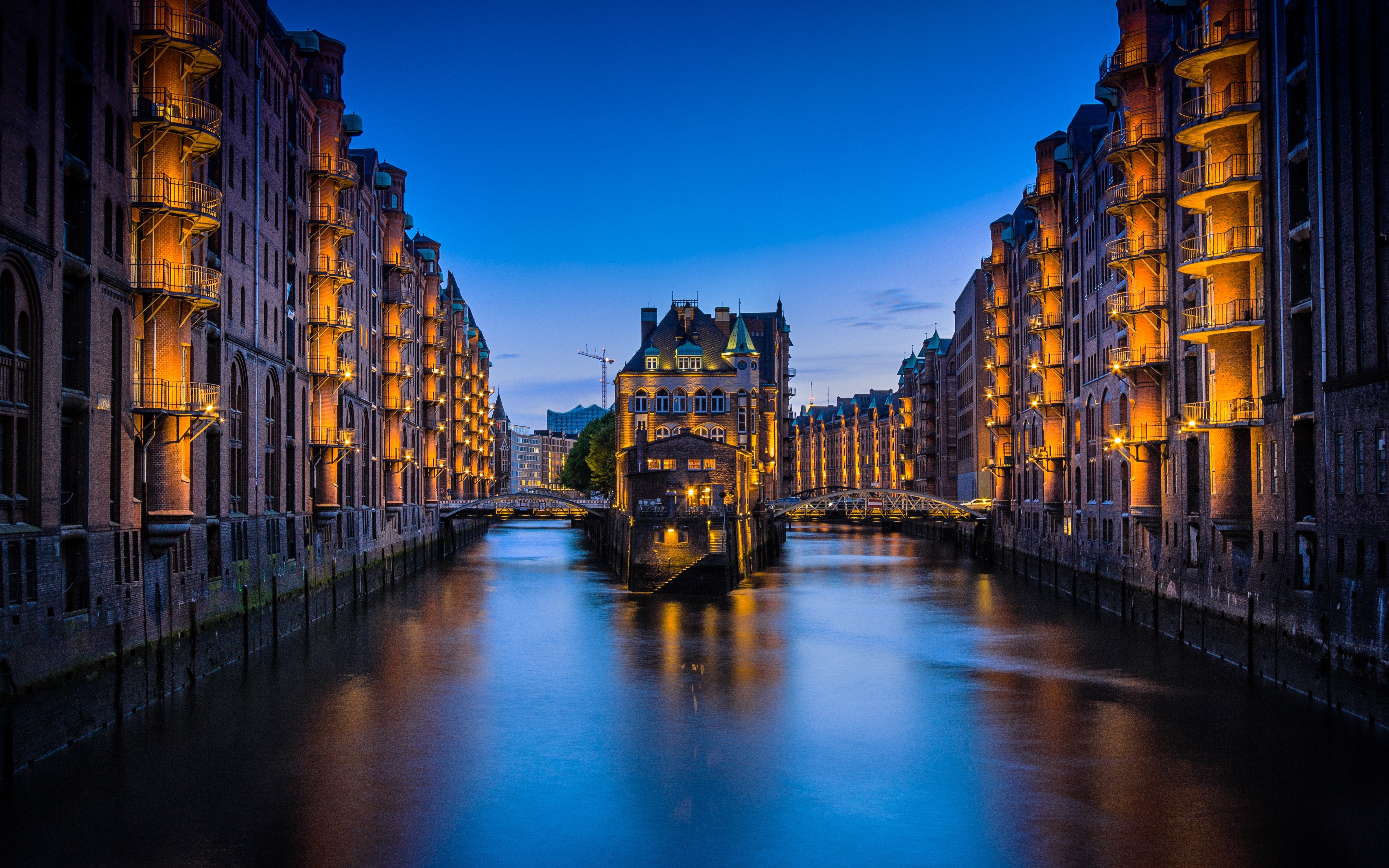 Speicherstadt warehouse district in Hamburg at dusk HD Wallpaper
