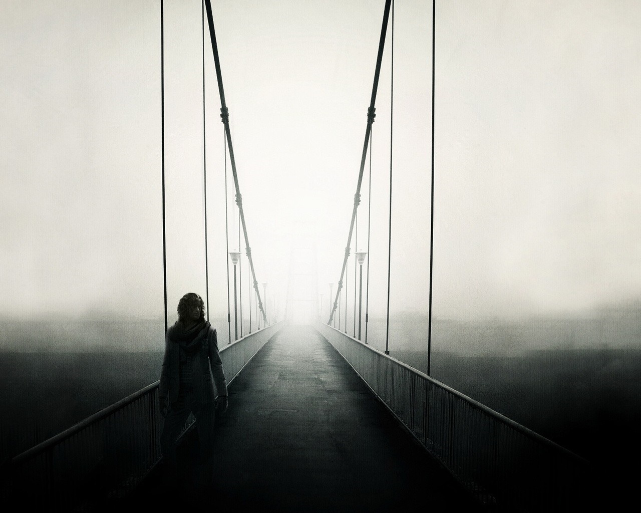 Person on a foggy suspension bridge HD Wallpaper