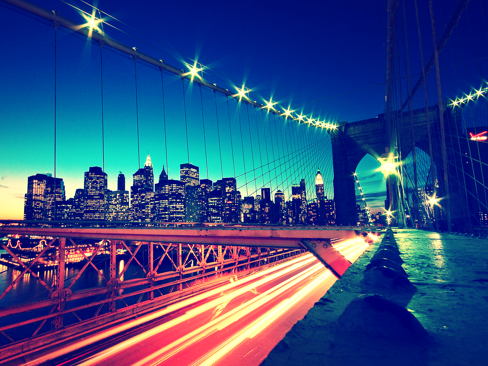 New York City skyline and Brooklyn Bridge at night HD Wallpaper