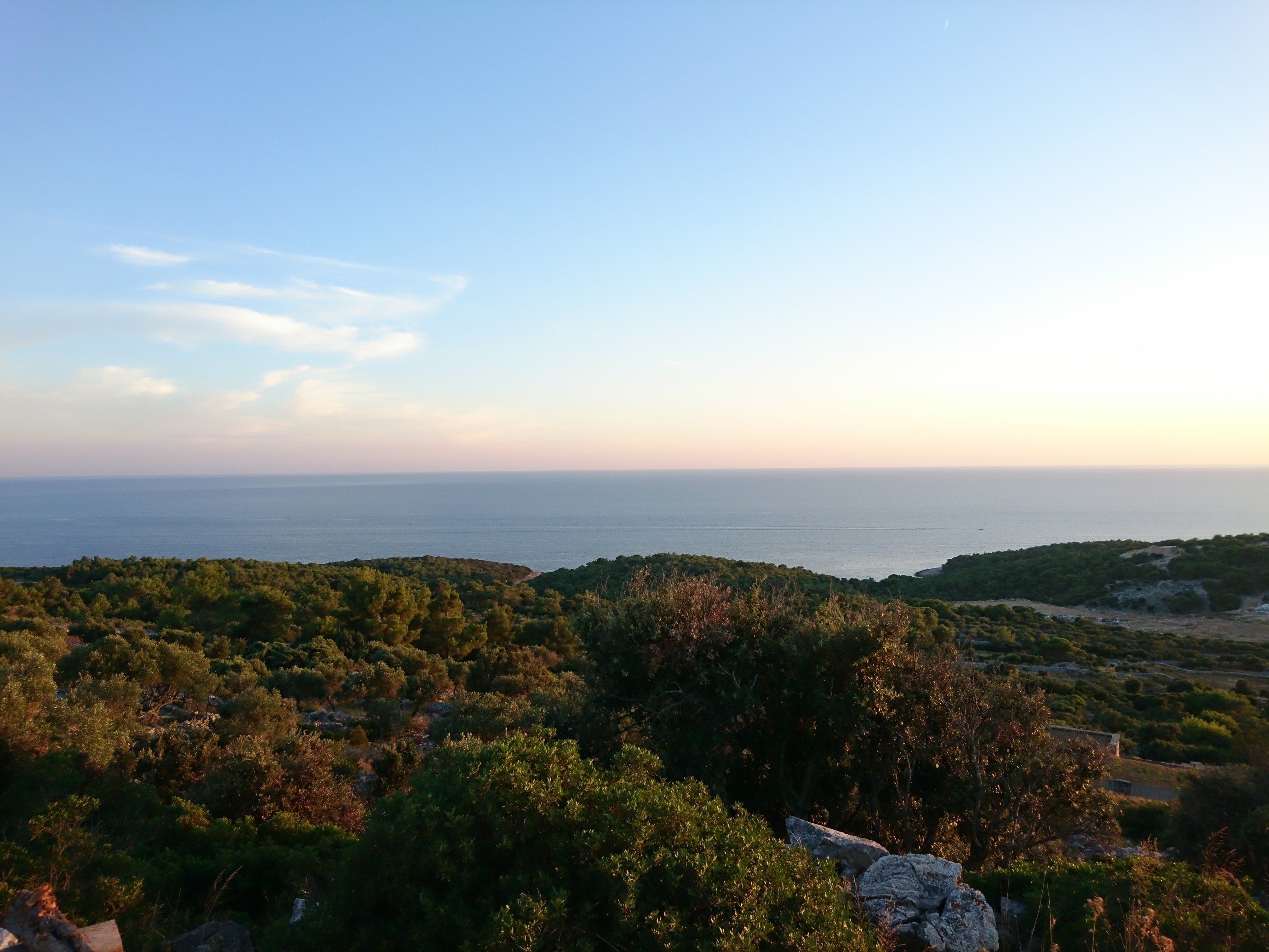 Sea and hills at sunset HD Wallpaper