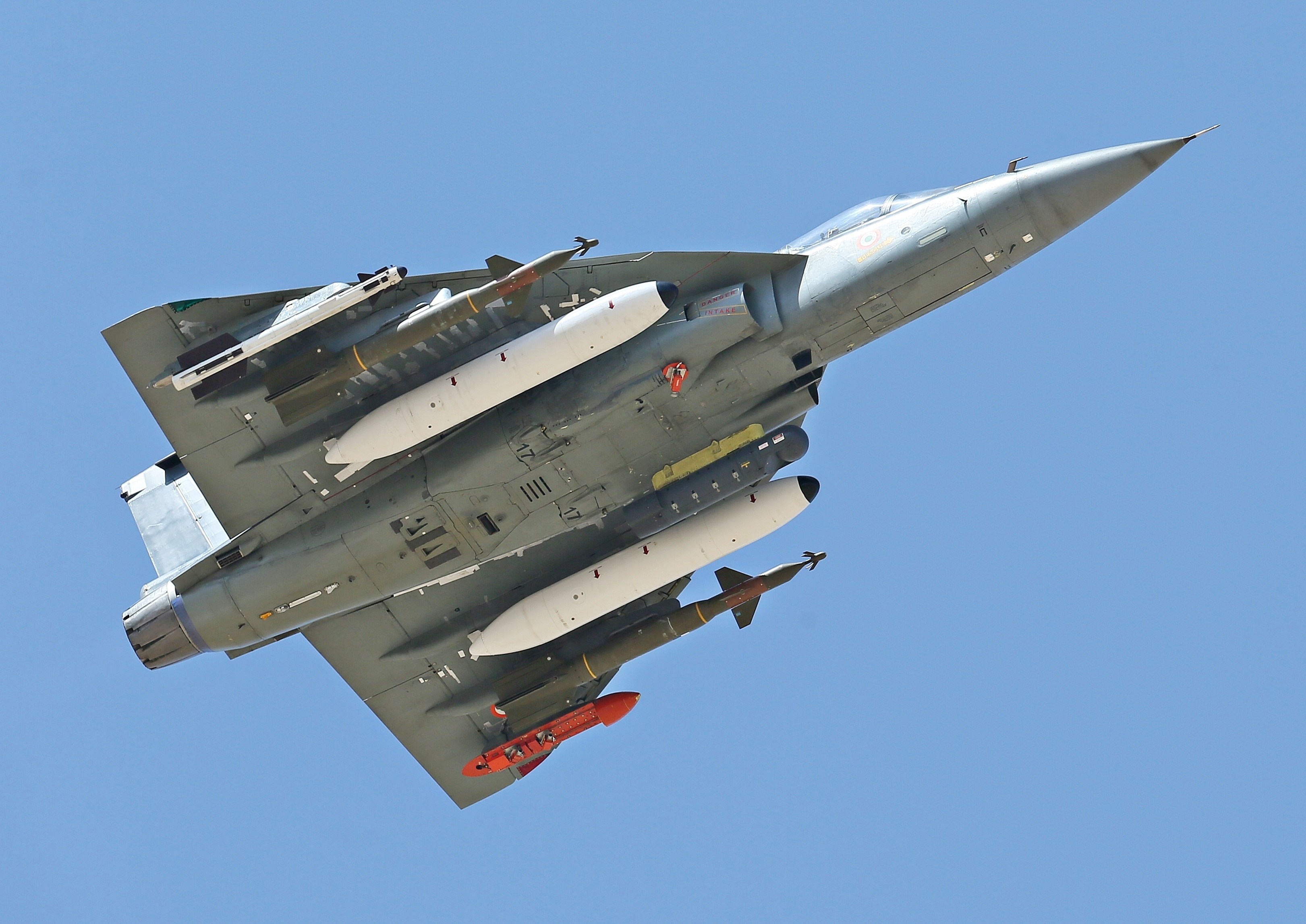 LCA Tejas fighter jet with missiles HD Wallpaper