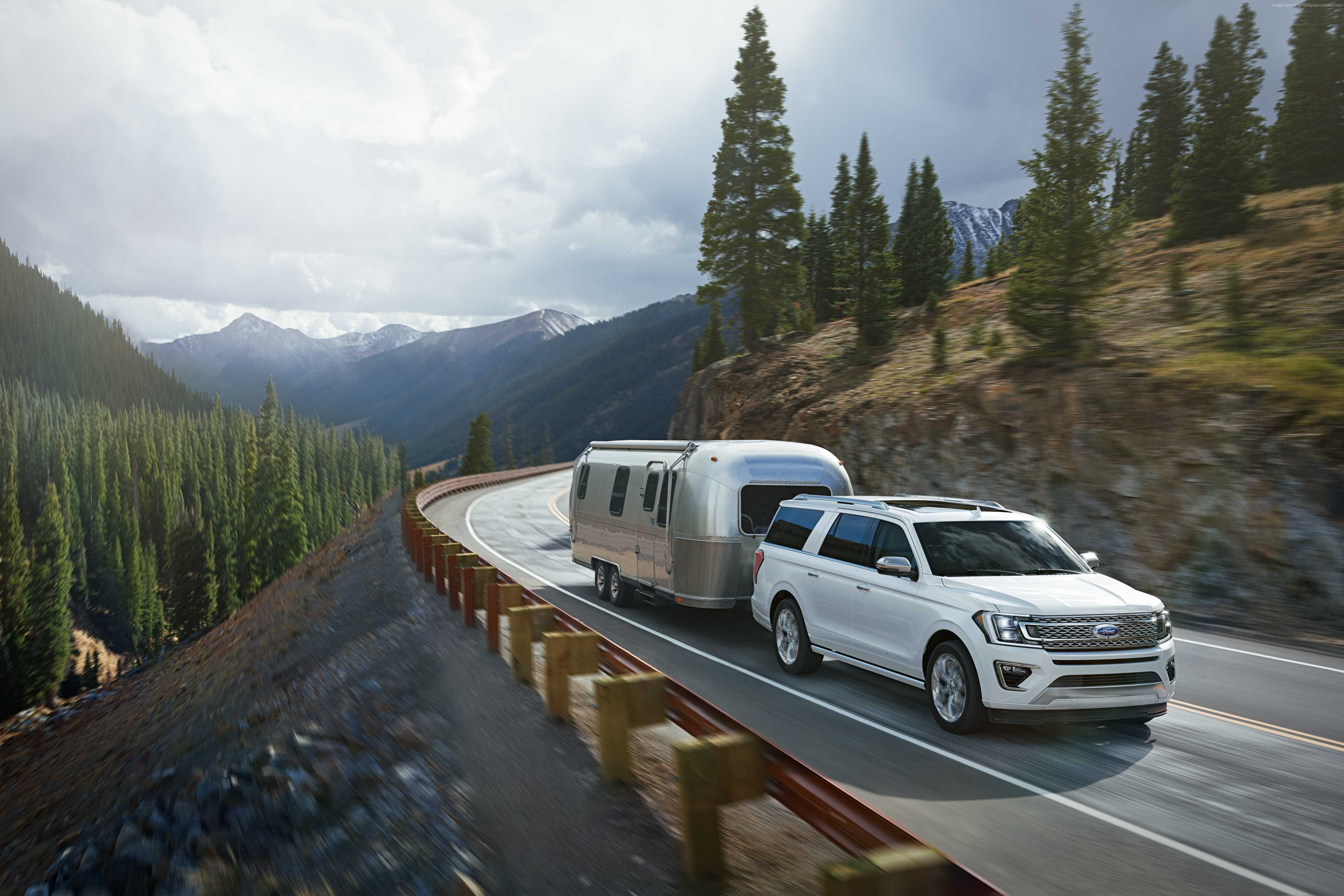 2018 Ford Expedition towing Airstream trailer in mountains HD Wallpaper