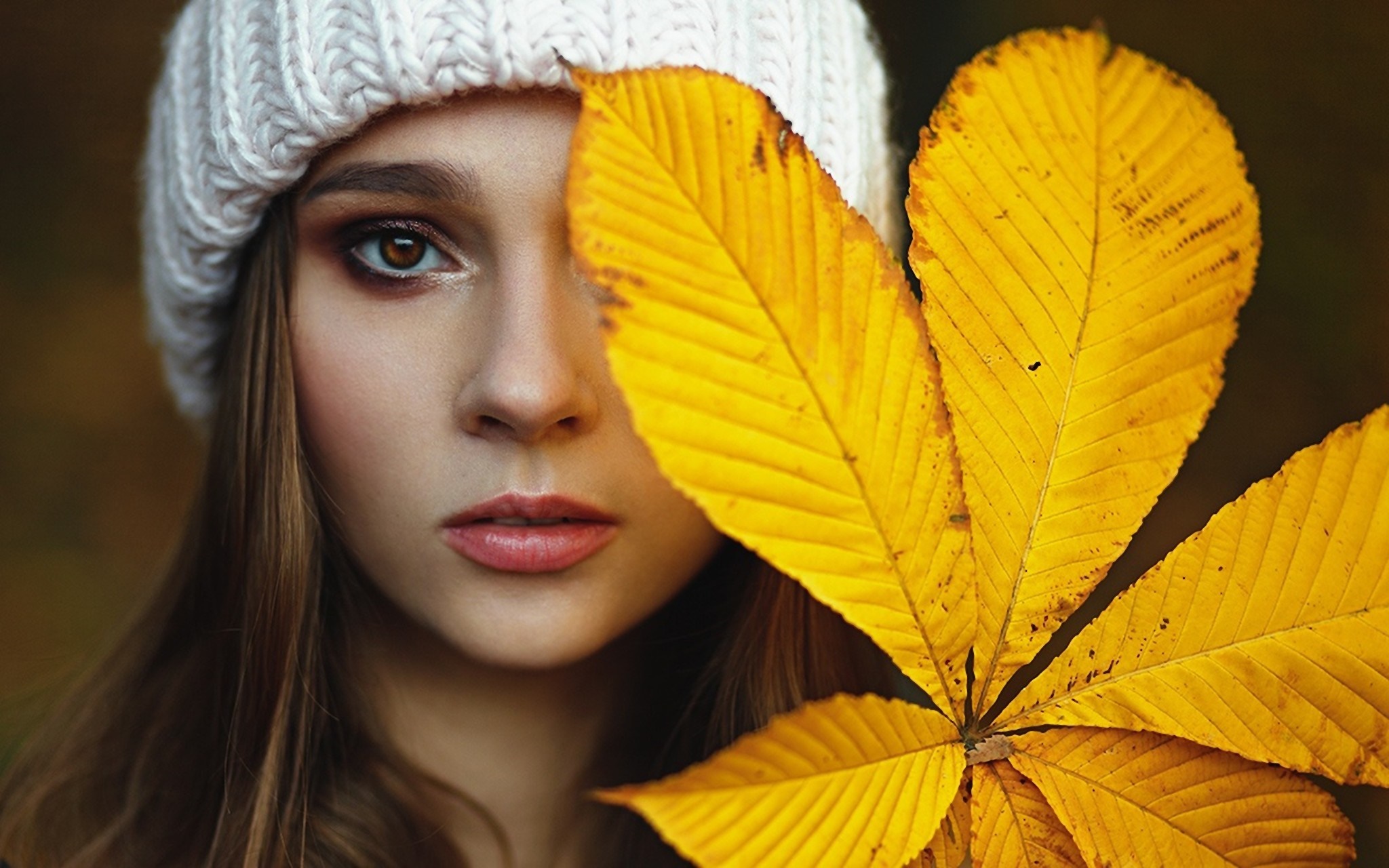Woman in white hat with yellow autumn leaves HD Wallpaper