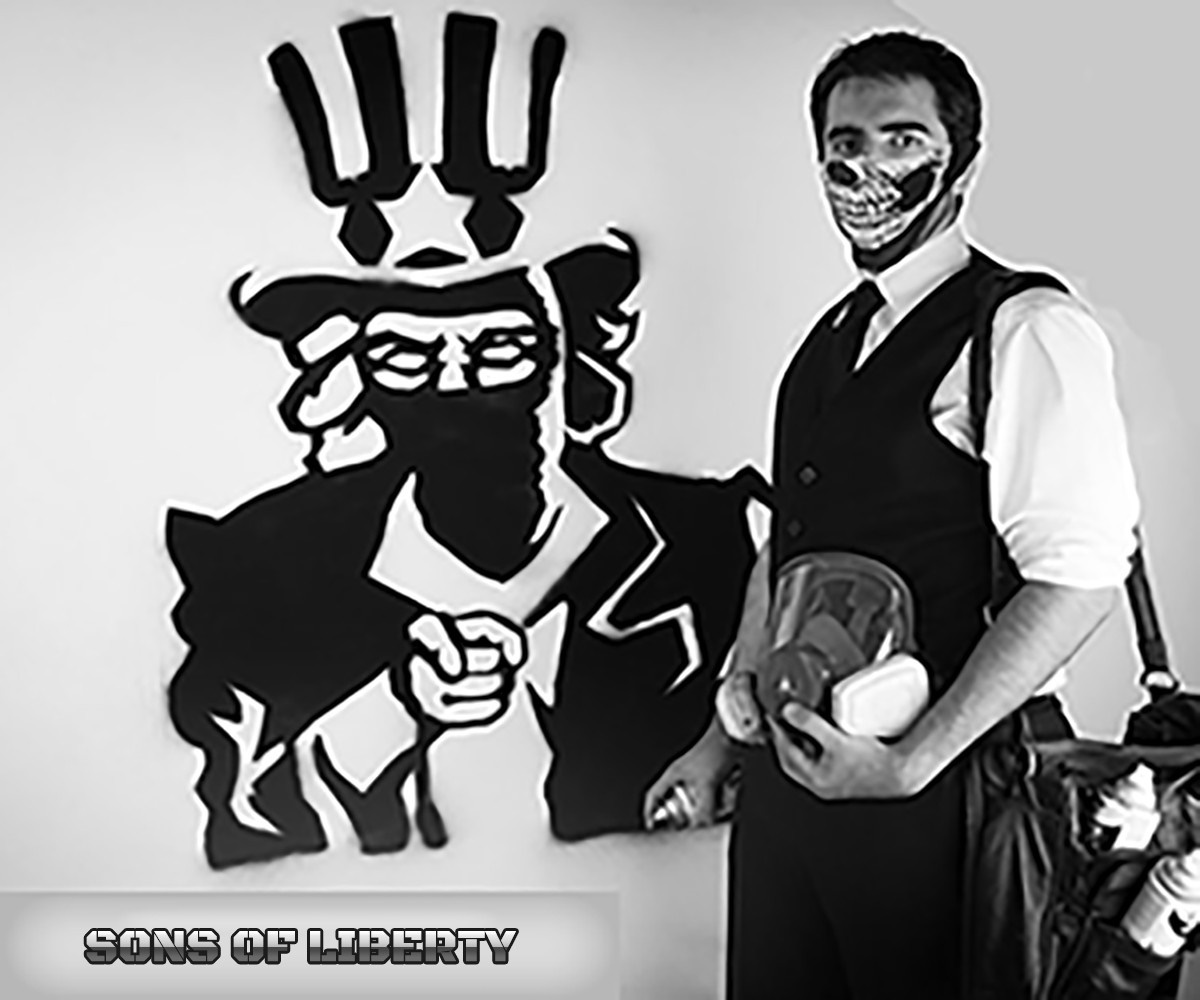 Man with skull mask and Sons of Liberty graffiti HD Wallpaper