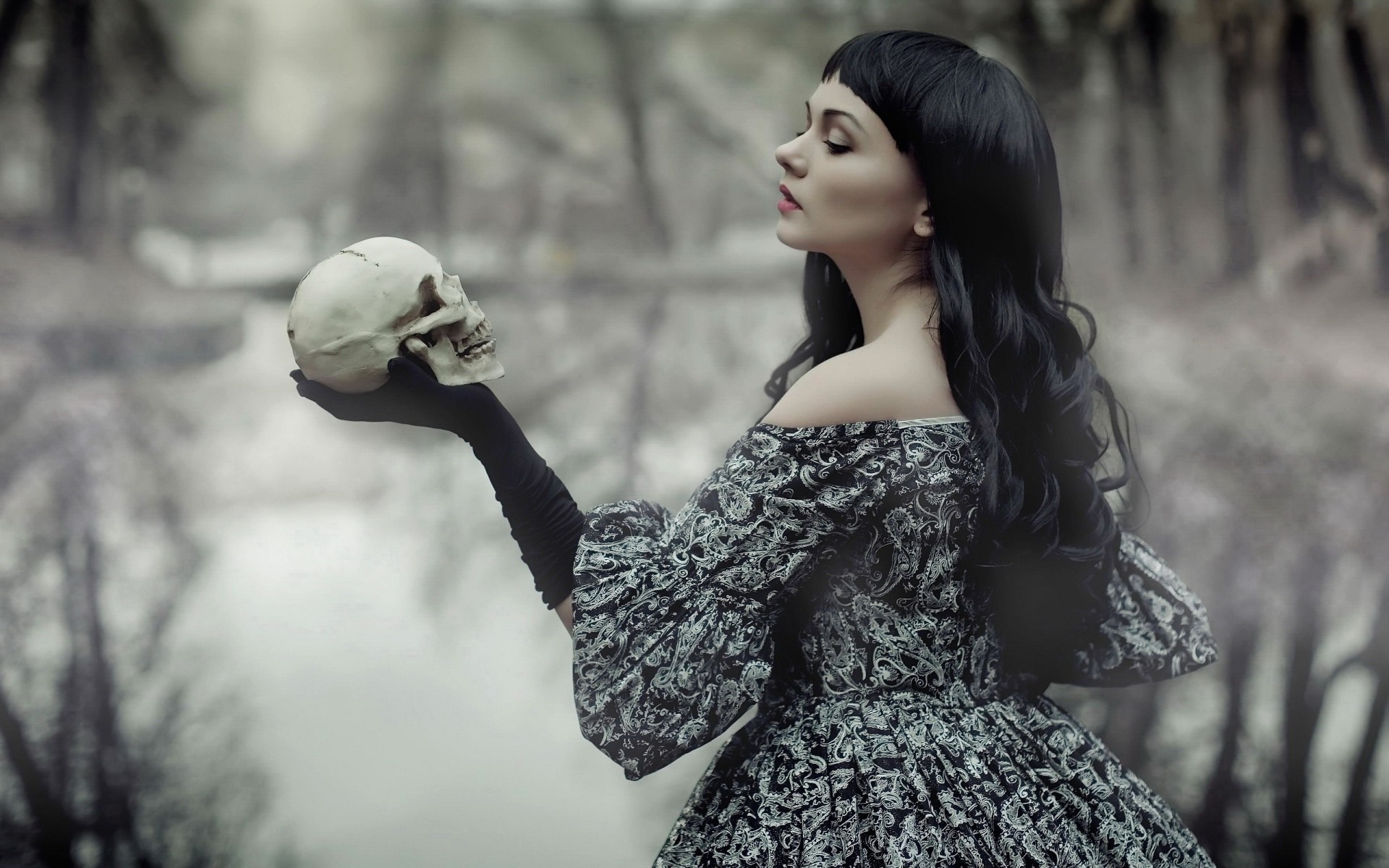 Woman in Gothic dress holding a skull HD Wallpaper