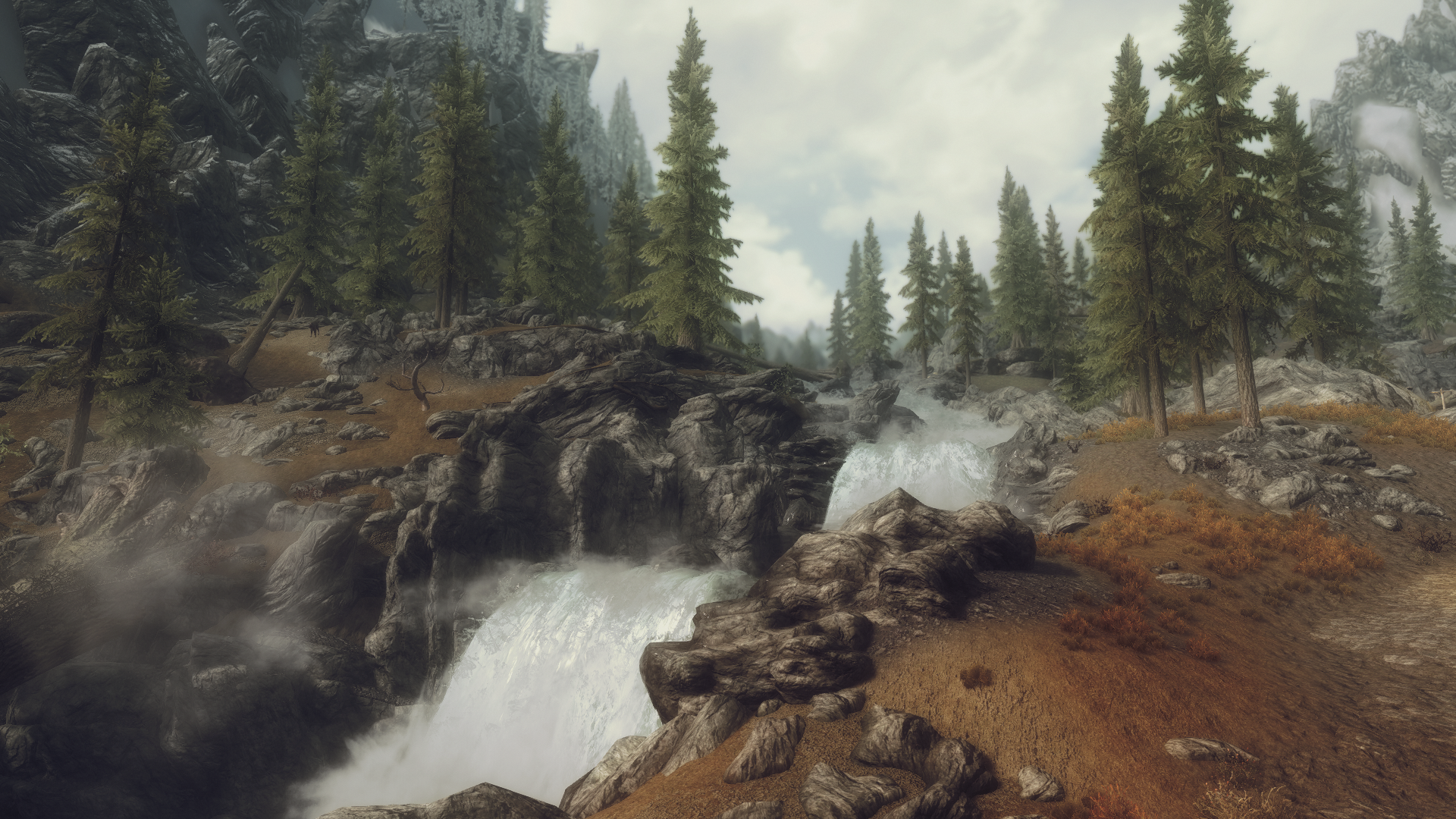 Waterfall in a rocky forest landscape from Skyrim HD Wallpaper