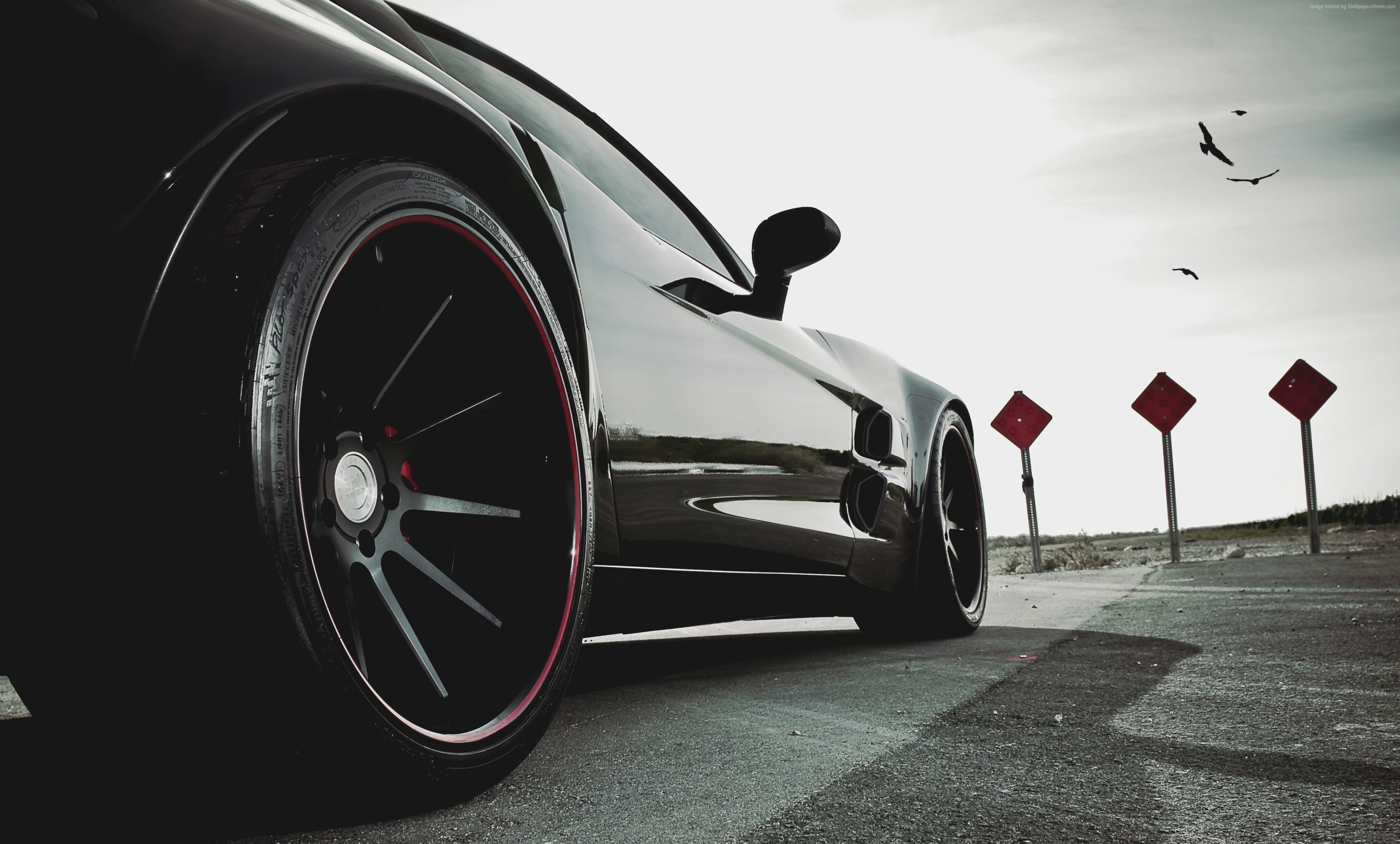 Black race car with red trim on wheels, 4K HD Wallpaper