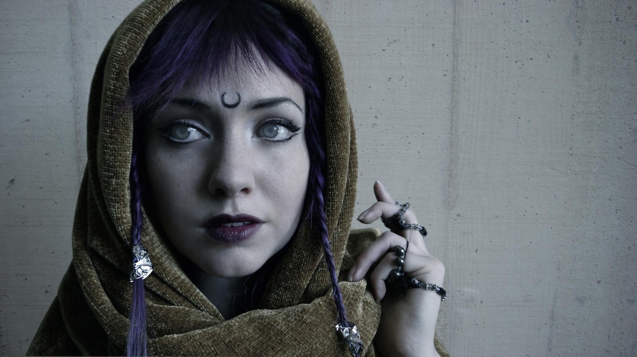 Woman with purple hair and moon tattoo wearing a hood HD Wallpaper