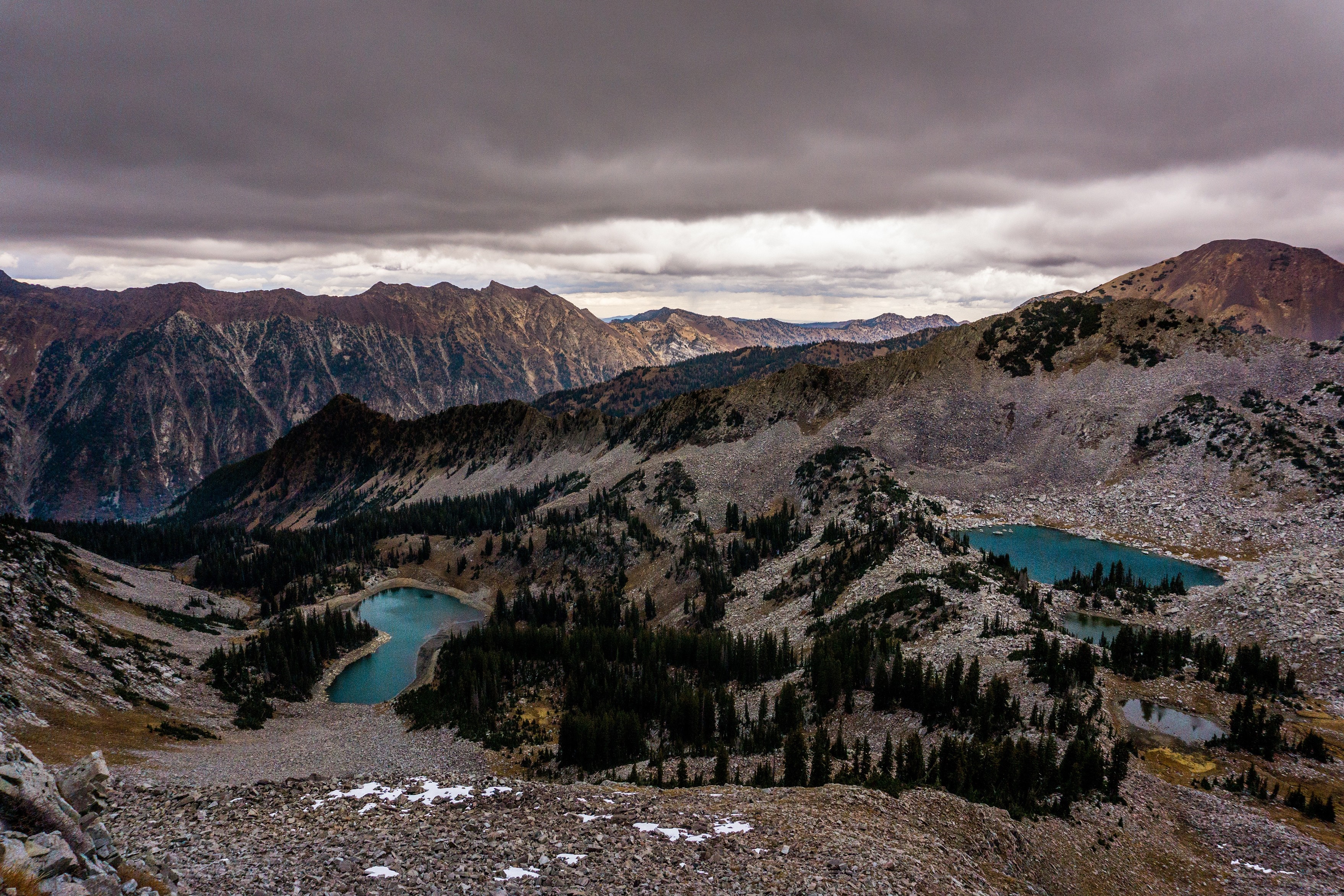 Mountain landscape with lakes and dramatic clouds HD Wallpaper