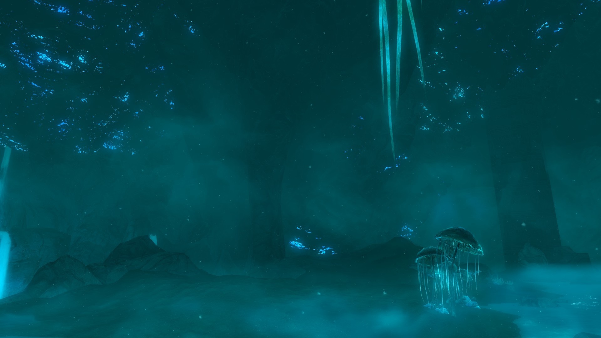 Underwater scene with glowing jellyfish and rock formations HD Wallpaper